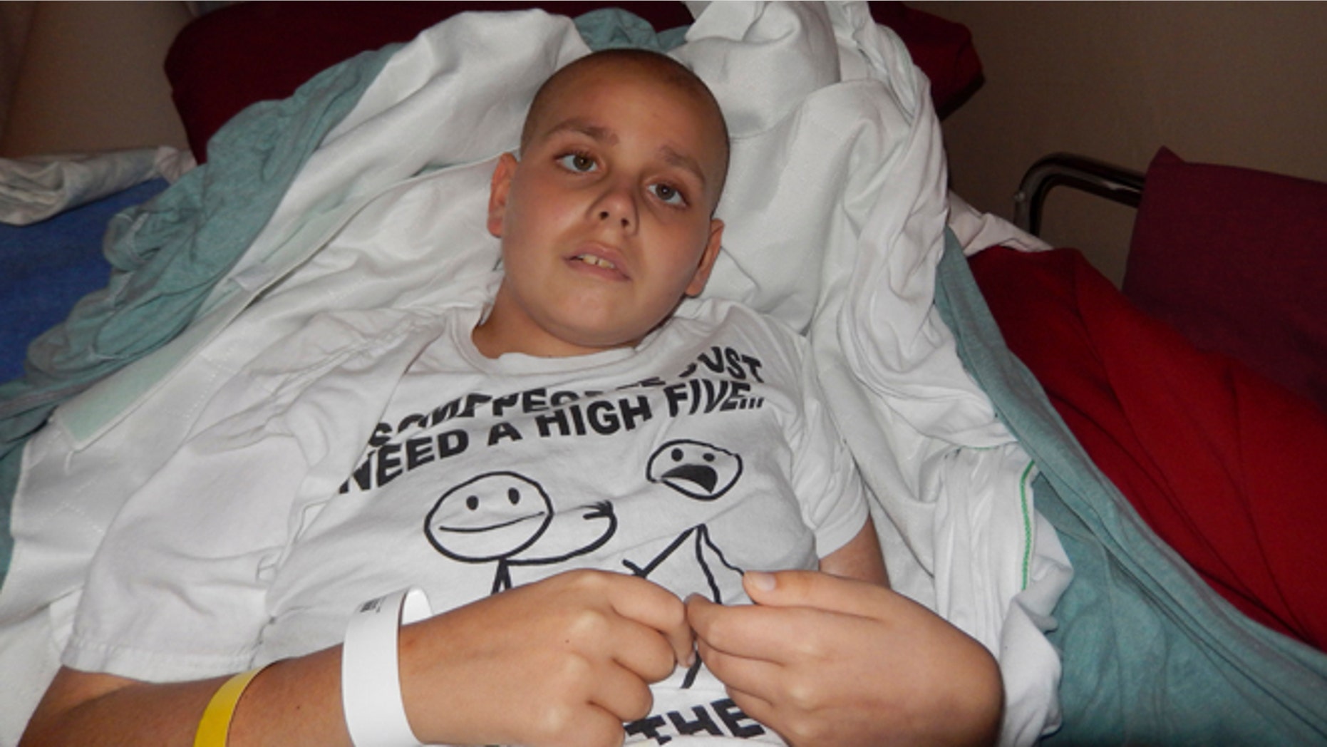 Oct. 28, 2013 photo: Devin Kohlman rests in his home in Port Clinton, Ohio after returning from a Cincinnati hospital.