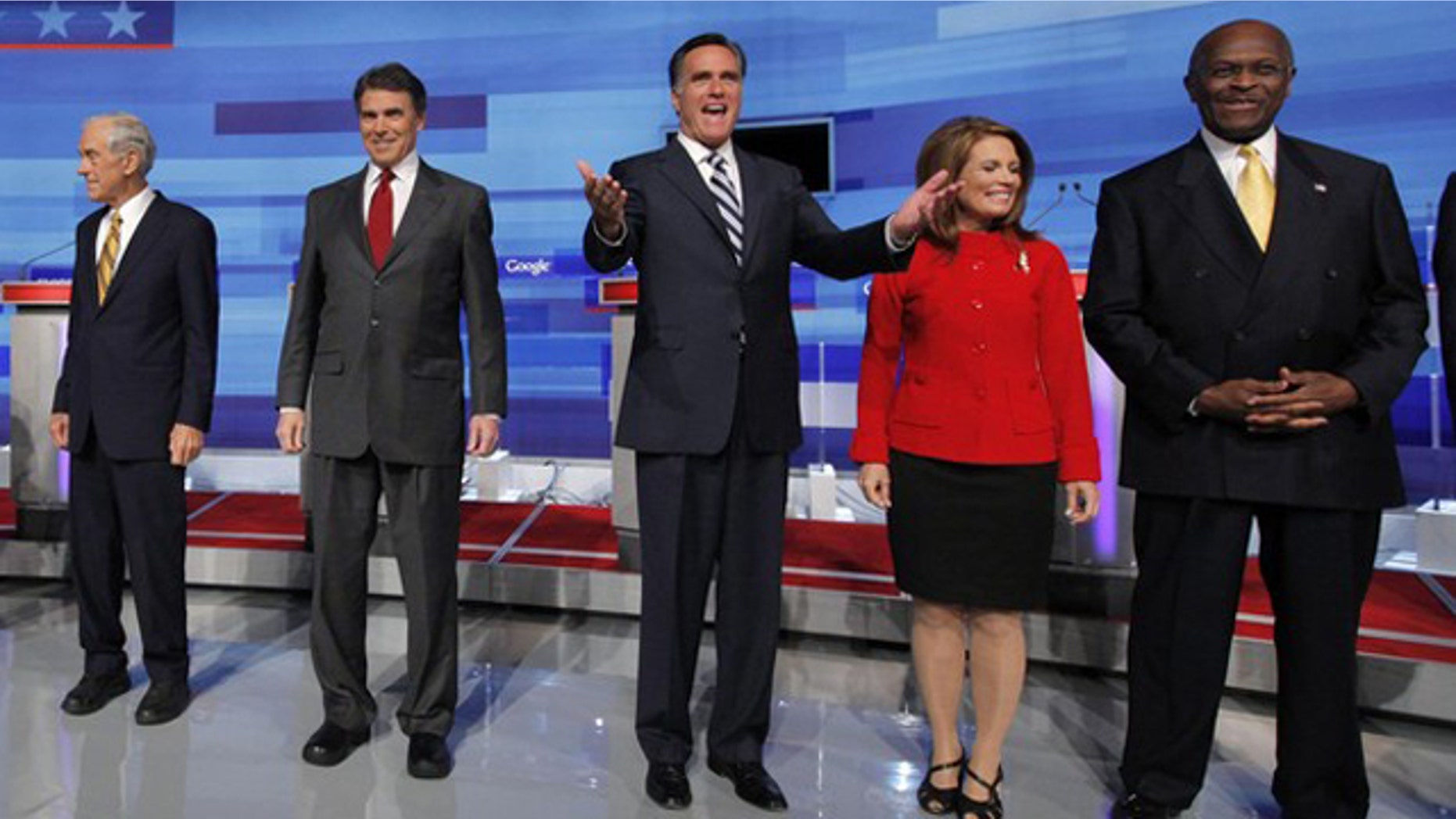 From left to right, Rep. Ron Paul; Texas Gov. Rick Perry; former Massachusetts Gov. Mitt Romney; Rep. Michele Bachmann; and businessman Herman Cain pose before a Fox News/Google debate in Orlando, Fla., Sept. 22.
