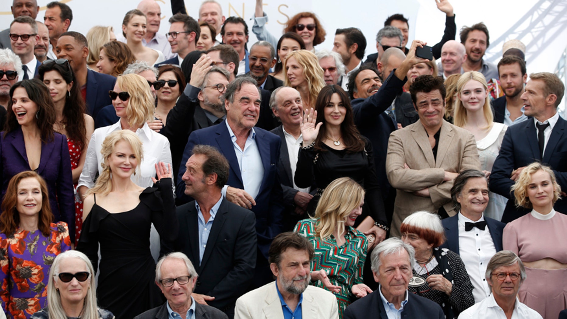 Actors and directors form former Cannes selections pose for photographers during the photo call for the 70th Anniversary of the international film festival, Cannes, southern France, Tuesday, May 23, 2017.