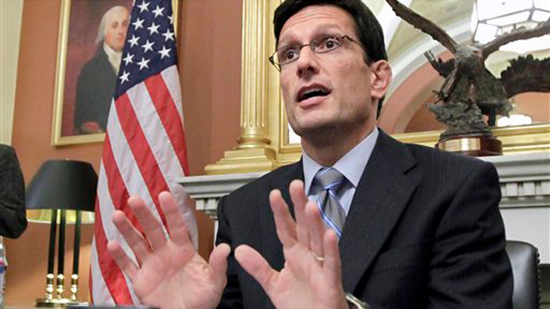 House Majority Leader Eric Cantor answers questions from reporters Oct. 3 on Capitol Hill.