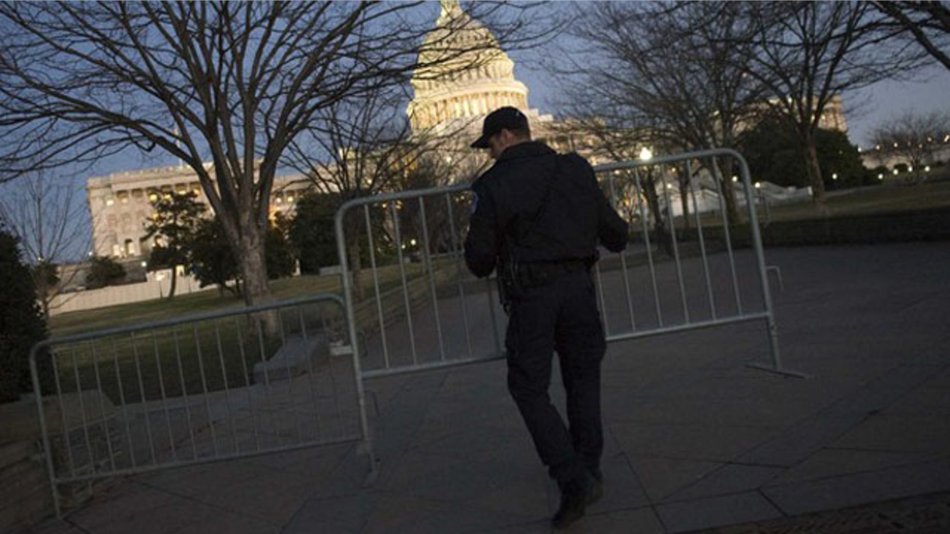 Jan. 24, 2012: Capitol Police officers secure the sidewalks around the U.S. Capitol before the State of the Union address on Capitol Hill.