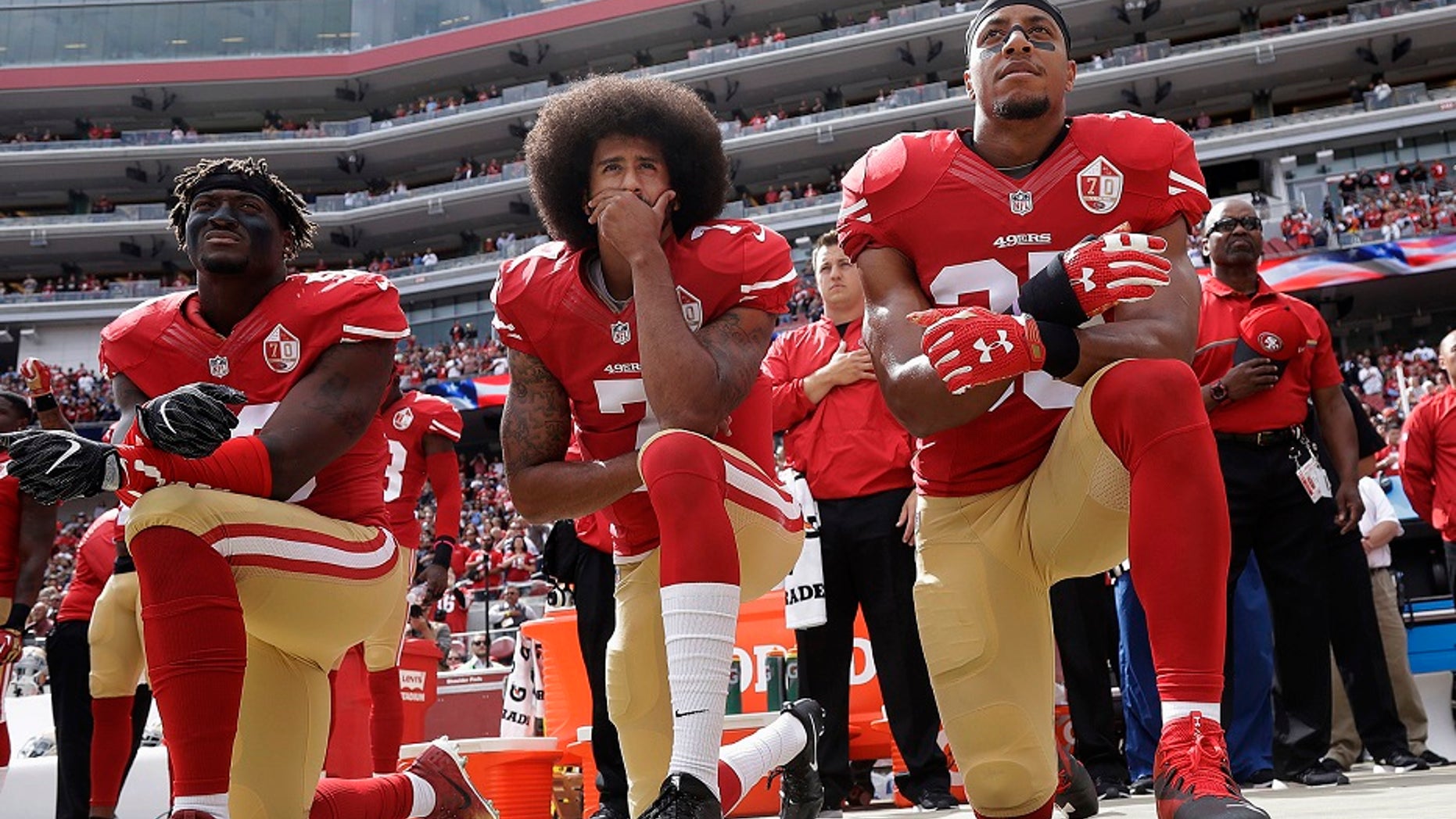 Former San Francisco 49ers quarterback Colin Kaepernick, center, received the Muhammad Ali Legacy Award in recognition of his defiant NFL protests.
