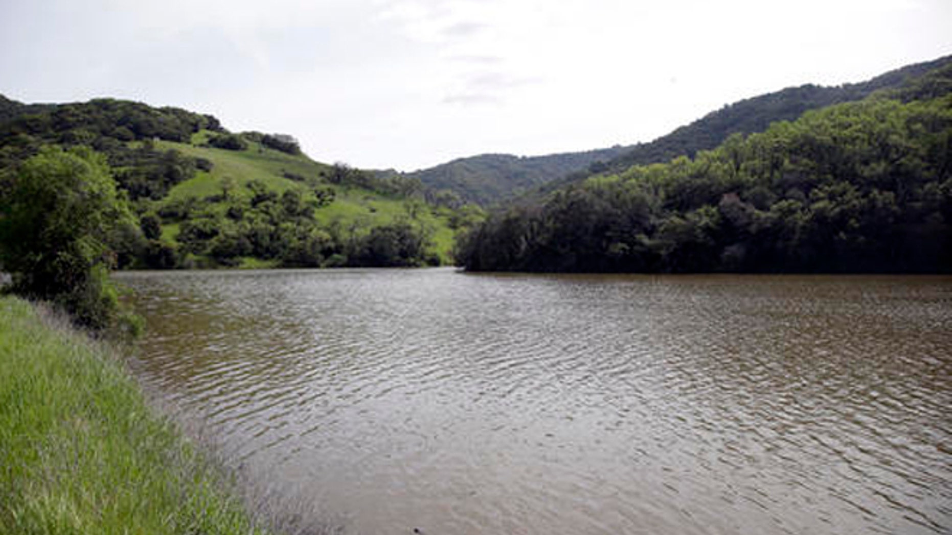 The Almaden Reservoir is filled after series of storms Monday, March 14, 2016, in San Jose, Calif. Four straight days of rain have replenished several key reservoirs in drought-stricken California. (AP Photo/Marcio Jose Sanchez)