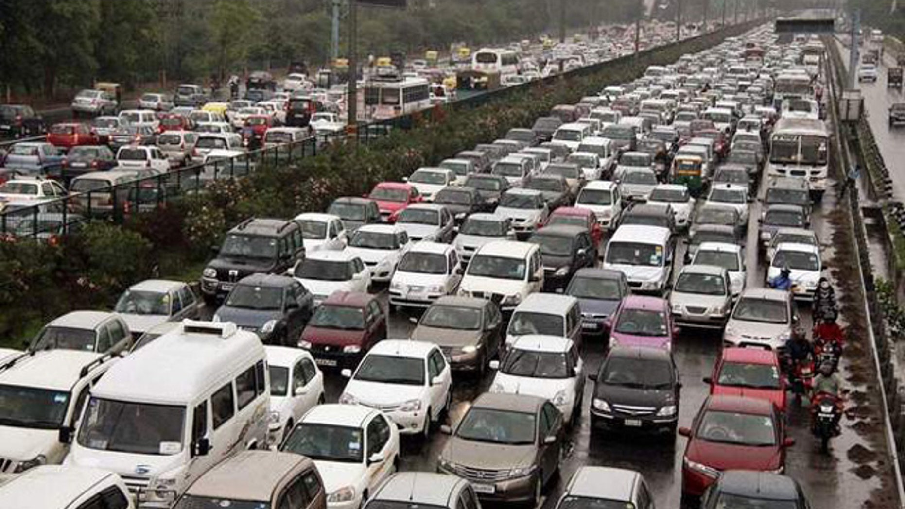 Traffic jam on the Delhi-Gurgaon road near New Delhi, India.