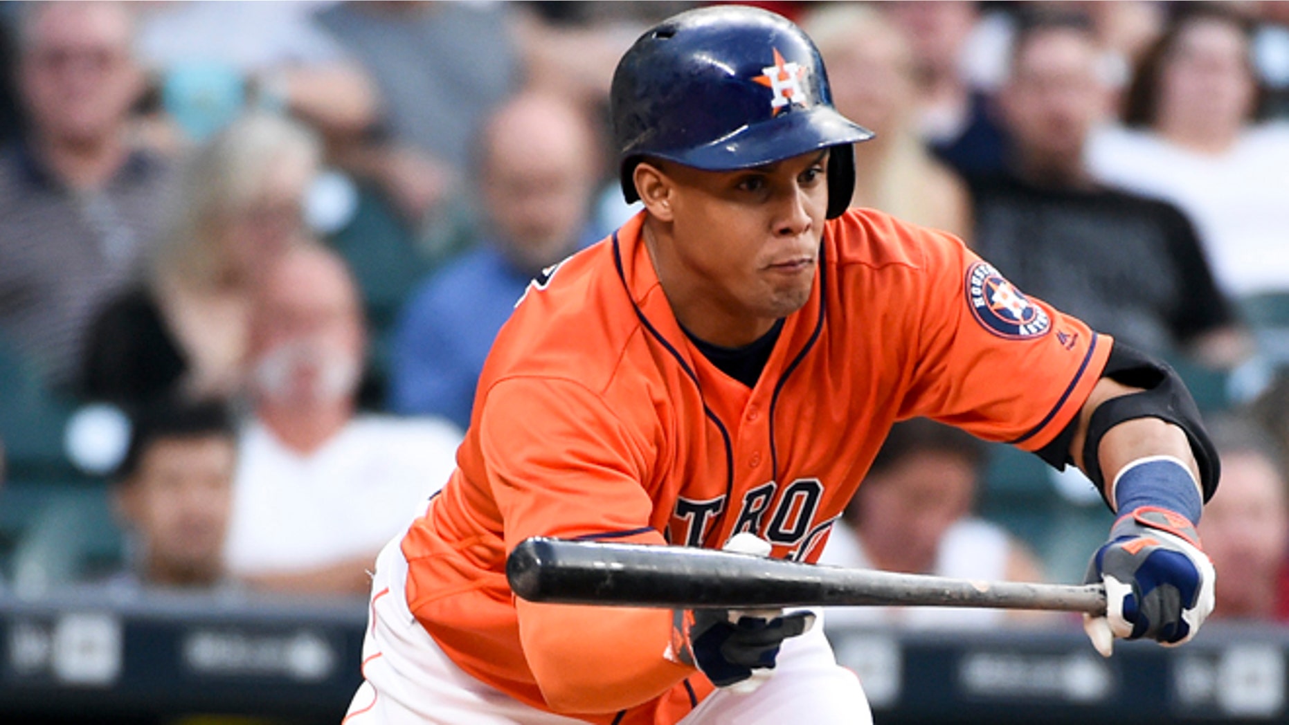 Houston Astros' Carlos Gomez bunts in the second inning of a baseball game against the Seattle Mariners, Friday, May 6, 2016, in Houston. (AP Photo/Eric Christian Smith)
