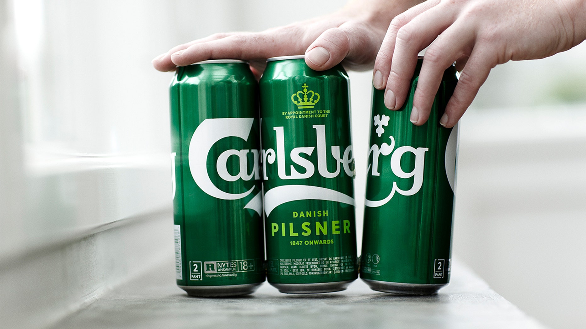 Carlsberg says its new "Snap Packs" will reduce the company's plastic use by more than 1,300 tons per year.
