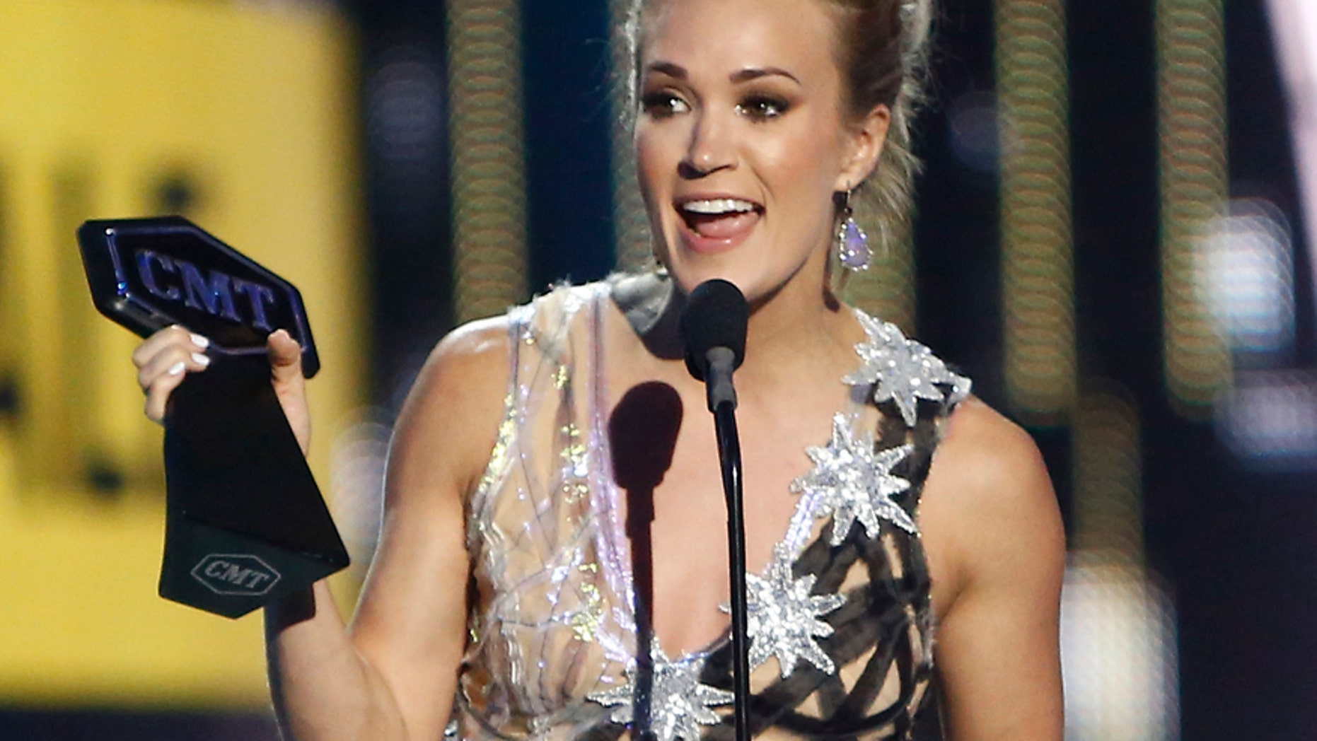 Carrie Underwood accepts the award for female video of the year for "Church Bells" at the CMT Music Awards at Music City Center on Wednesday, June 7, 2017, in Nashville, Tenn.