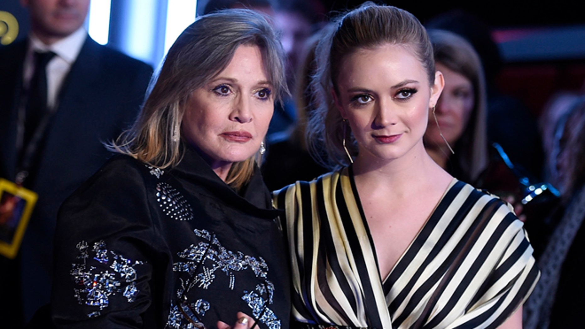 FILE- In this Dec. 14, 2015, file photo, Carrie Fisher, left, and daughter Billie Lourd arrive at the world premiere of "Star Wars: The Force Awakens" at the TCL Chinese Theatre in Los Angeles. Lourd says the support shes received since the death of her mother and her grandmother, Debbie Reynolds, has given her strength. (Photo by Jordan Strauss/Invision/AP, File)