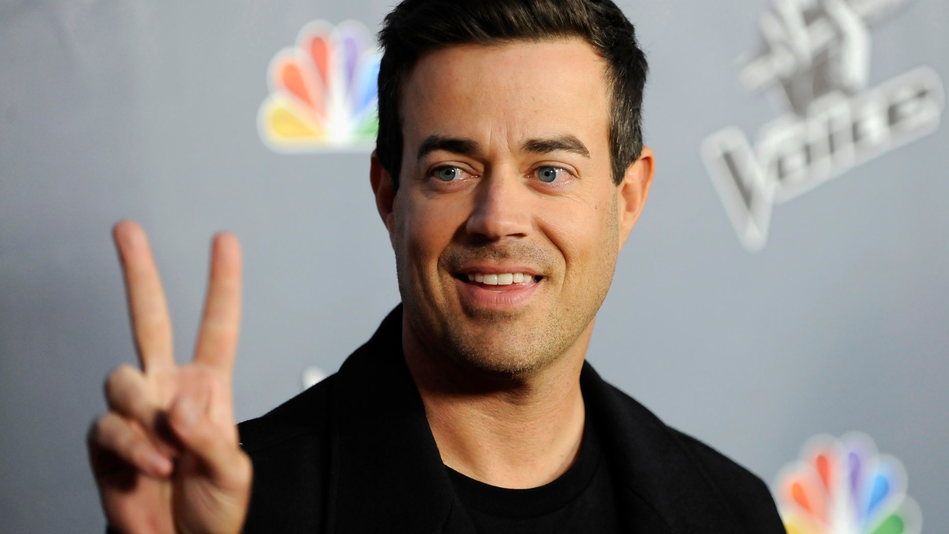Television personality and "The Voice" host Carson Daly arrives at the "The Voice" Season 4 premiere screening in Los Angeles, California March 20, 2013. REUTERS/Gus Ruelas (UNITED STATES - Tags: ENTERTAINMENT) - RTR3F96O