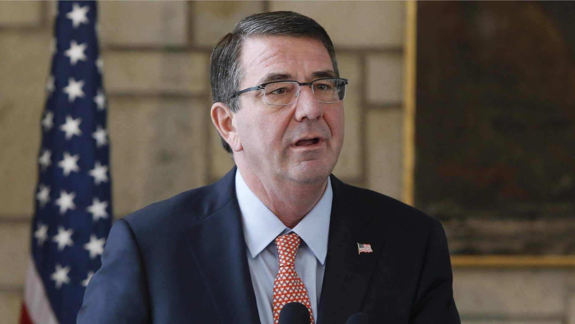 Feb. 21, 2015: U.S. Defense Secretary Ash Carter makes remarks during a news conference with Afghan President Ashraf Ghani at the Presidential Palace in Kabul, Afghanistan.
