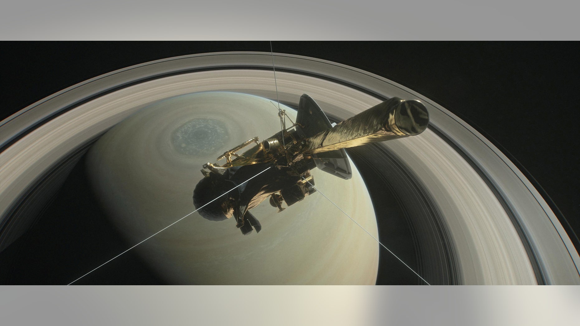 File photo: The spacecraft Cassini is pictured above Saturn's northern hemisphere prior to making one of its Grand Finale dives in this NASA handout illustration obtained by Reuters August 29, 2017. (NASA/Handout via REUTERS)