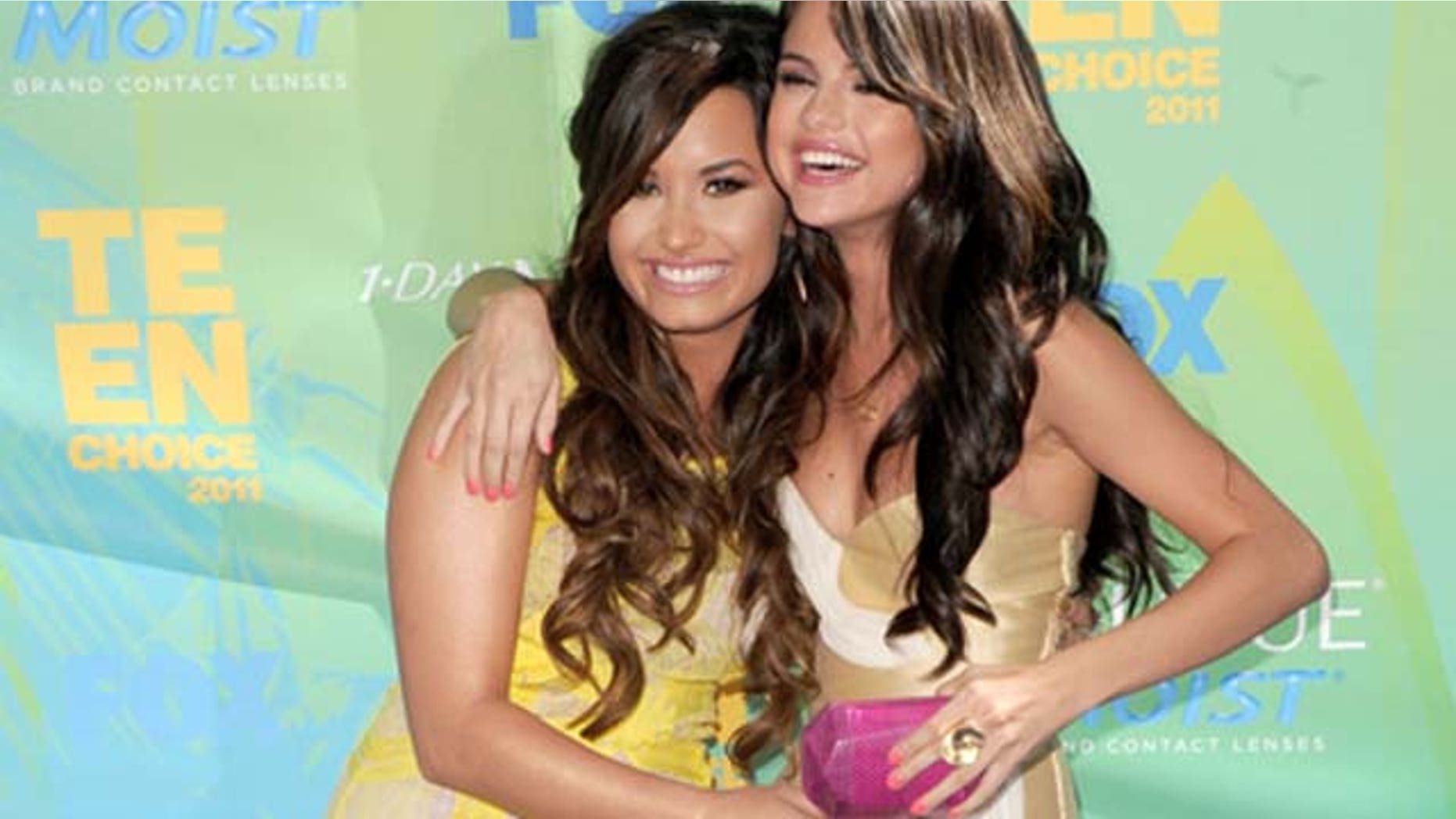 August 07, 2011: Actresses/singers Demi Lovato and Selena Gomez arrive at the 2011 Teen Choice Awards held at the Gibson Amphitheatre in Universal City, Calif.