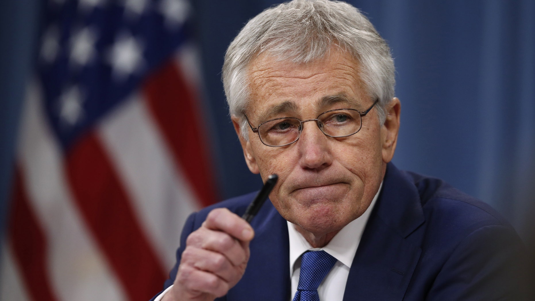 FILE - In this Dec. 19, 2013 file photo, Defense Secretary Chuck Hagel takes questions as he briefs reporters at the Pentagon in Washington. In taking a deep look at trouble inside U.S. nuclear forces, Hagel is searching for the root causes of recent Air Force missteps but also for ways to make the nuclear warrior’s job more attractive when the military has turned its attention away from such weapons. (AP Photo/Charles Dharapak)