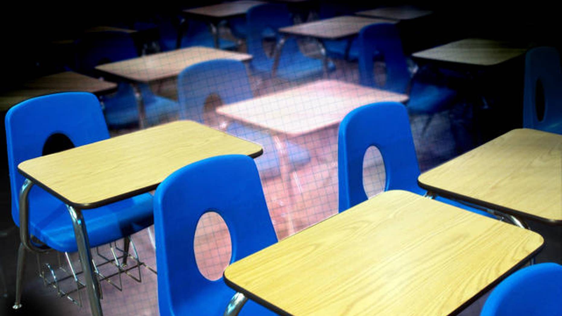 Classroom desks used at Decker College await auction Friday, Feb. 10, 2006 at the site of the former school in Louisville, Ky. Decker, a for-profit trade school run by former Massachusetts Gov. William Weld, is now closed, mired in bankruptcy proceedings and under FBI investigation in a case that has cast a long shadow over Weld's bid to become the next governor of New York. (AP Photo/Brian Bohannon)
