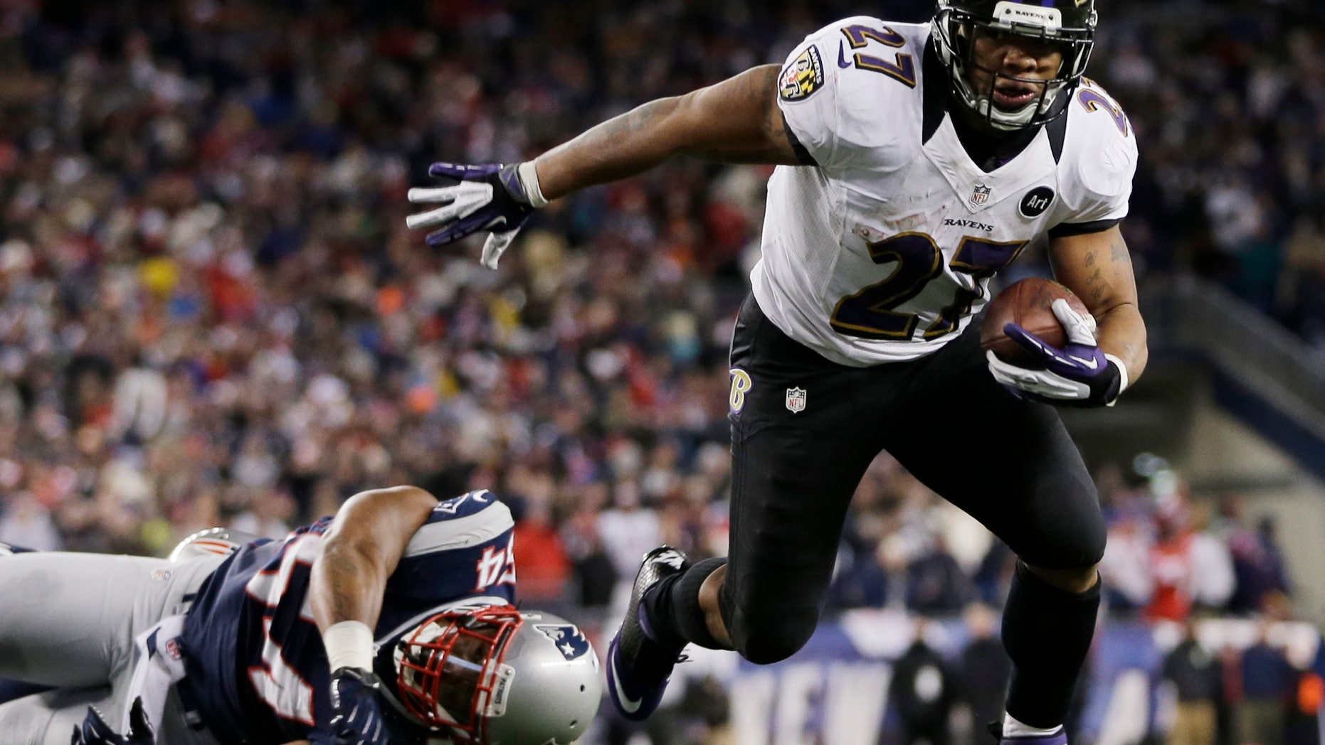 Jan. 20, 2013: Baltimore Ravens running back Ray Rice goes in for a two-yard touchdown run against New England Patriots outside linebacker Donta Hightower (54) during the first half of the NFL football AFC Championship football game in Foxborough, Mass. (AP)