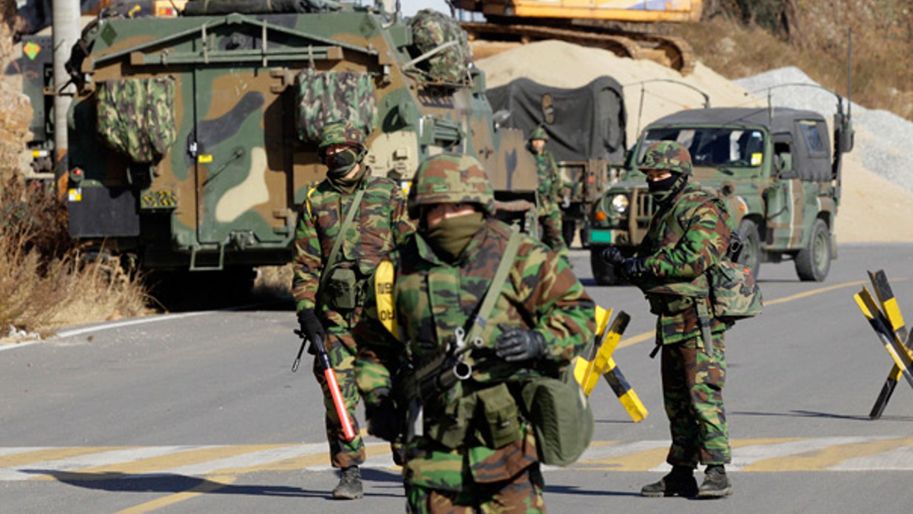 Nov. 29: South Korean marines guard Yeonpyeong island, South Korea.