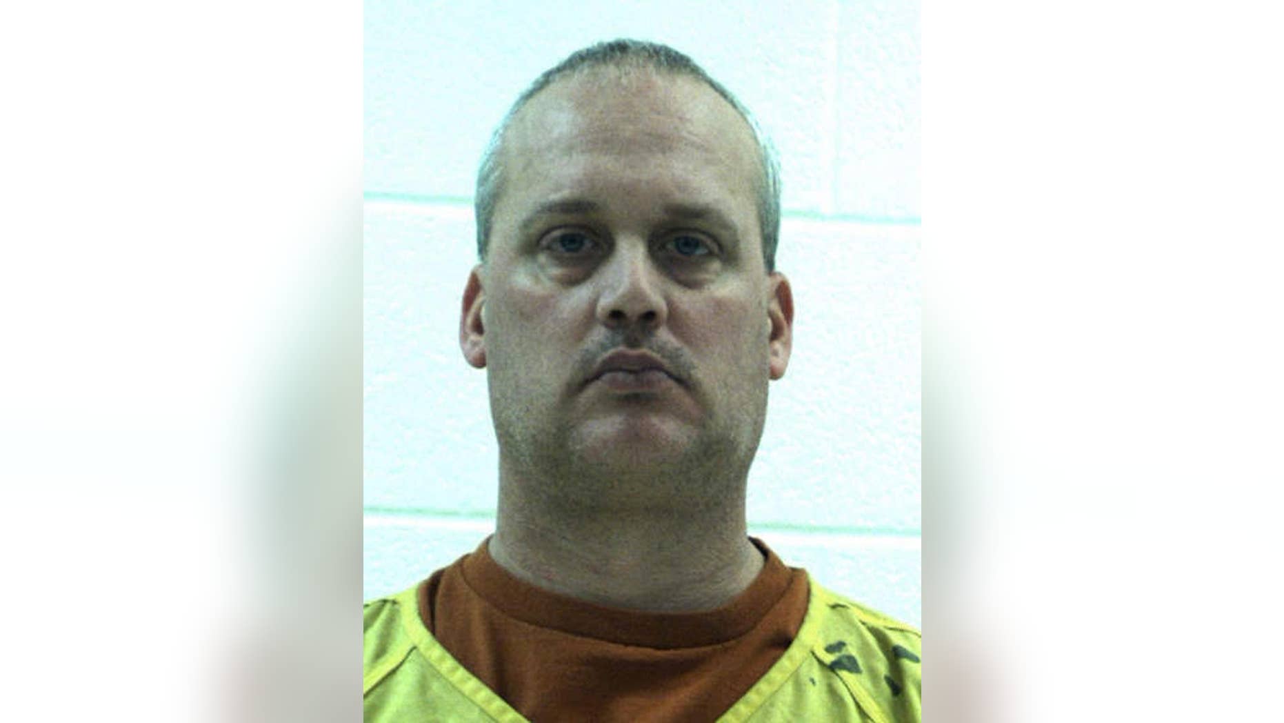This undated photo provided by the Centre County Correctional Facility shows Jeffrey Sandusky who was charged Monday, Feb. 13, 2017, with multiple charges of sexual offenses involving children. Jeffrey Sandusky is one of former Penn State assistant coach Jerry Sandusky's sons who is serving a lengthy prison sentence for sexual abuse. (Centre County Correctional Facility via AP)