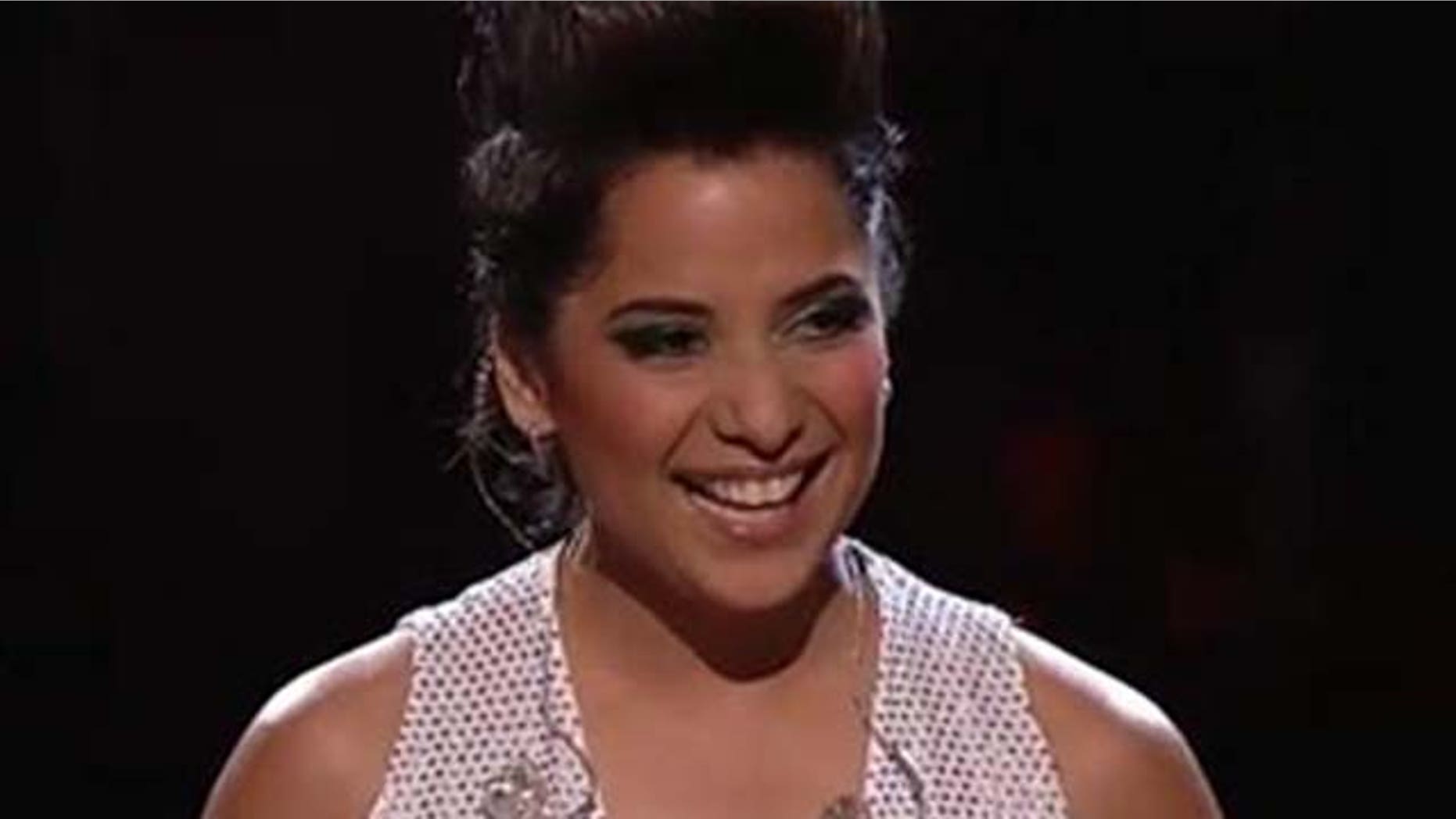 June 21, 2011: Vicci Martínez smiles as her coach music producer and singer Cee Lo Green congratulates her on a good performance on NBC's 'The Voice.'