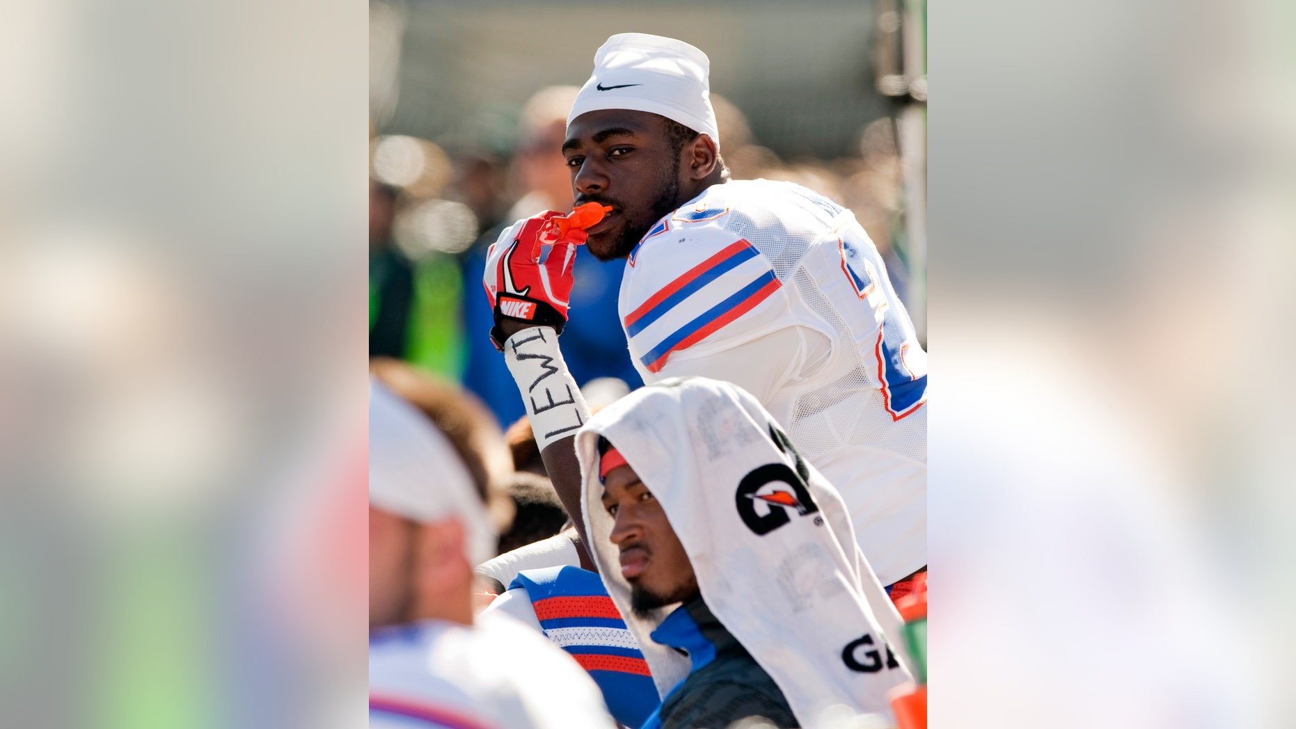 Florida's Marcus Maye chews on his mouthpiece as he sits on the bend late in the fourth quarter of an NCAA college football game against Missouri Saturday, Oct. 19, 2013, in Columbia, Mo. Missouri won the game 36-17. (AP Photo/L.G. Patterson)