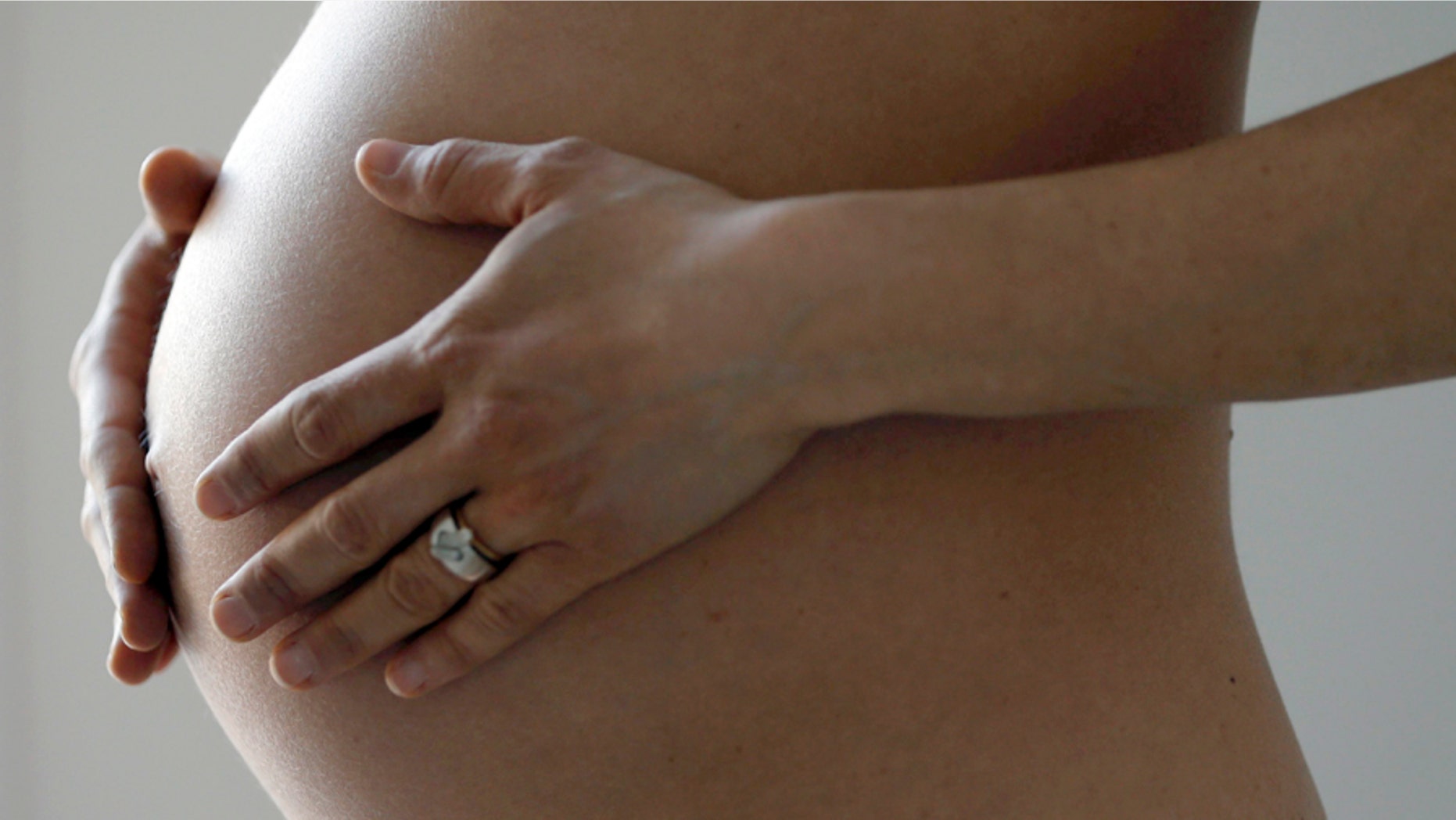 A pregnant woman, in the last trimester of her pregnancy, poses in this illustration photo in Sete, South France, March 26, 2016. REUTERS/Regis Duvignau - D1AESVWZKMAB