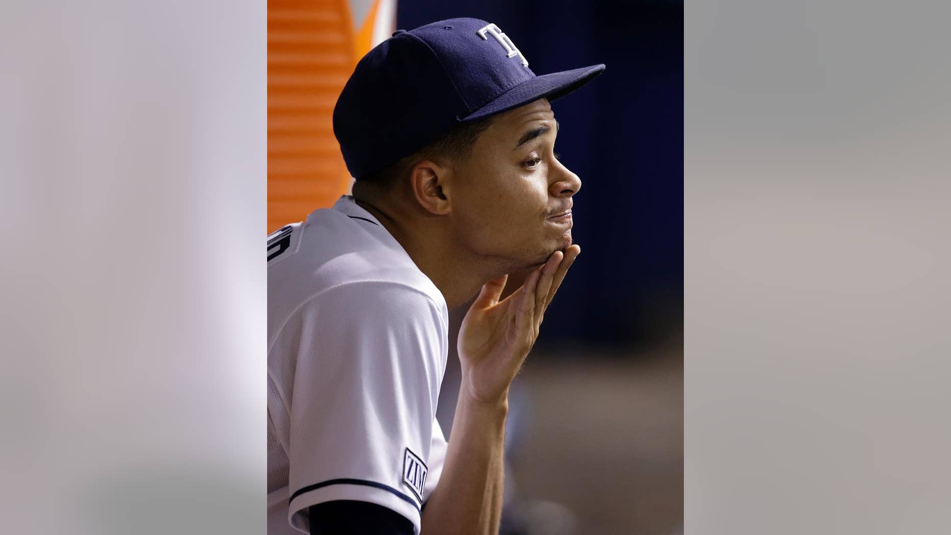 Tampa Bay Rays starting pitcher Chris Archer sits in the dugout after giving up three runs to the Pittsburgh Pirates during the third inning of an interleague baseball game Tuesday, June 24, 2014, in St. Petersburg, Fla. (AP Photo/Chris O'Meara)