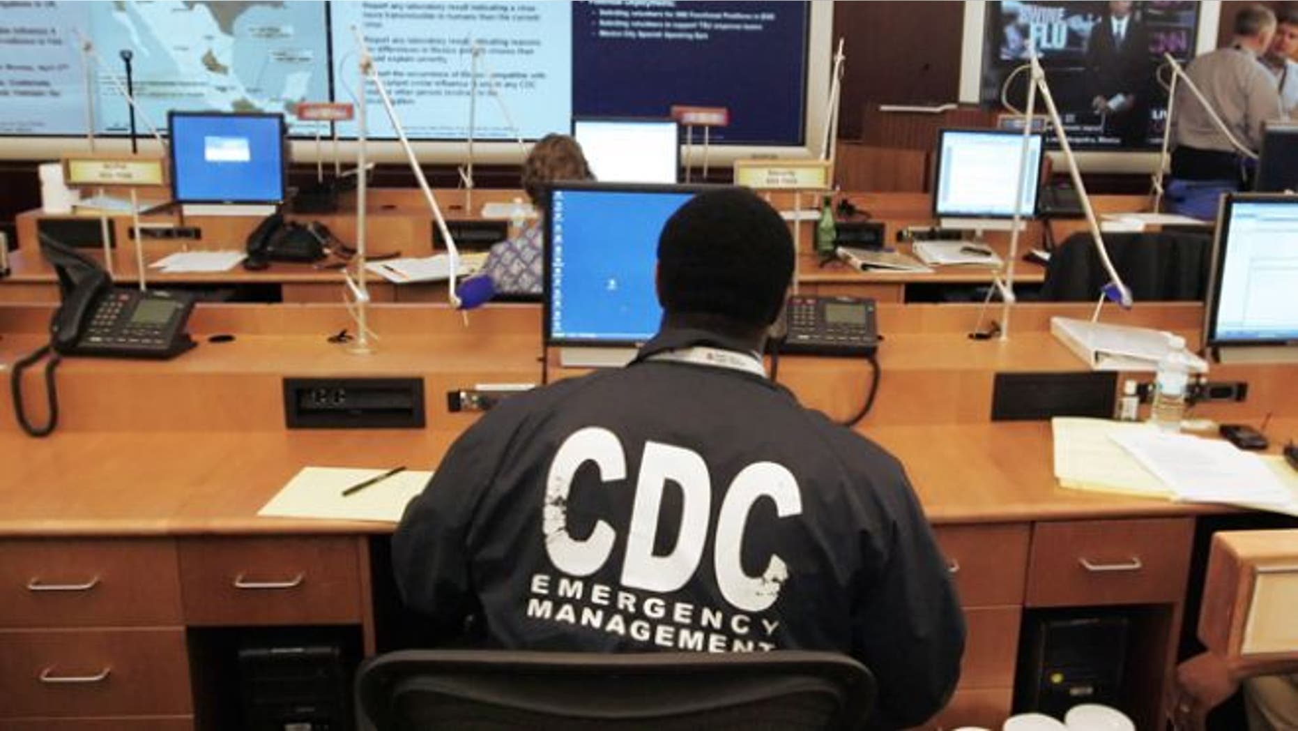 UNDATED: A worker at the Center for Disease Control and Prevention sits at a station in the emergency operations center at the CDC.