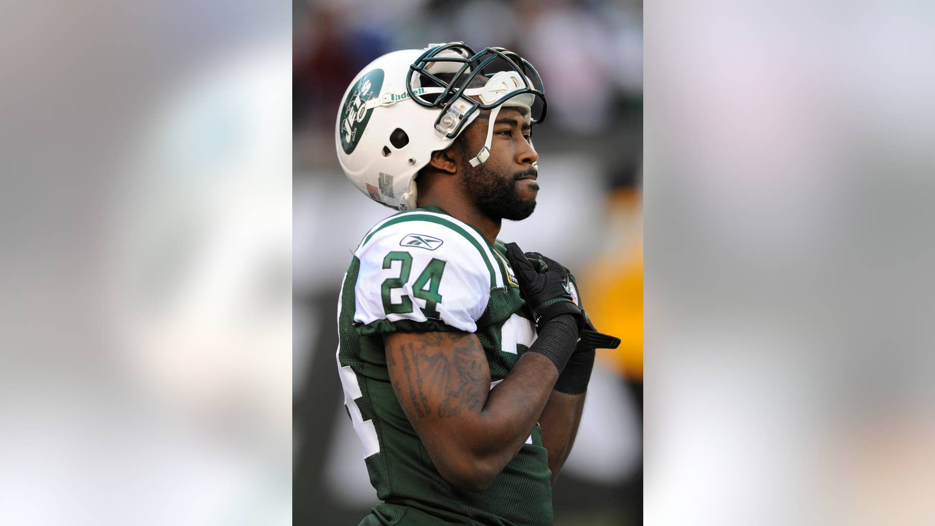 File-This Dec. 24, 2011 file photo shows New York Jets' Darrelle Revis before an NFL football game between the New York Giants and the New York Jets, in East Rutherford, N.J. The Jets have traded Revis to the Buccaneers for this year's No. 13 overall draft pick and another selection next year. (AP Photo/Bill Kostroun, File)