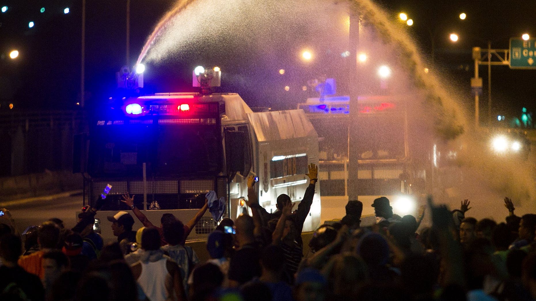 Security Forces Break Up Venezuela Protests With Water Tanks, Tear Gas ...