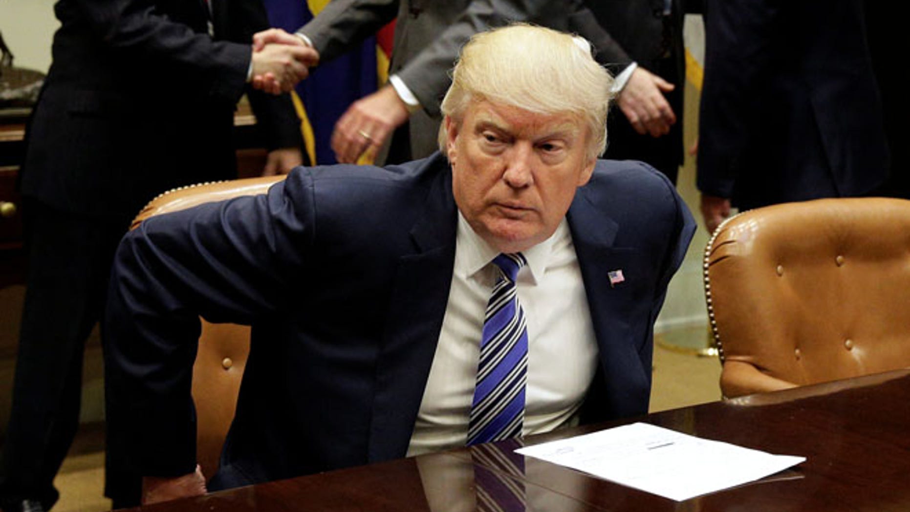 June 6: U.S. President Donald Trump takes his seat during a meeting with Republican Congressional leaders at the White House