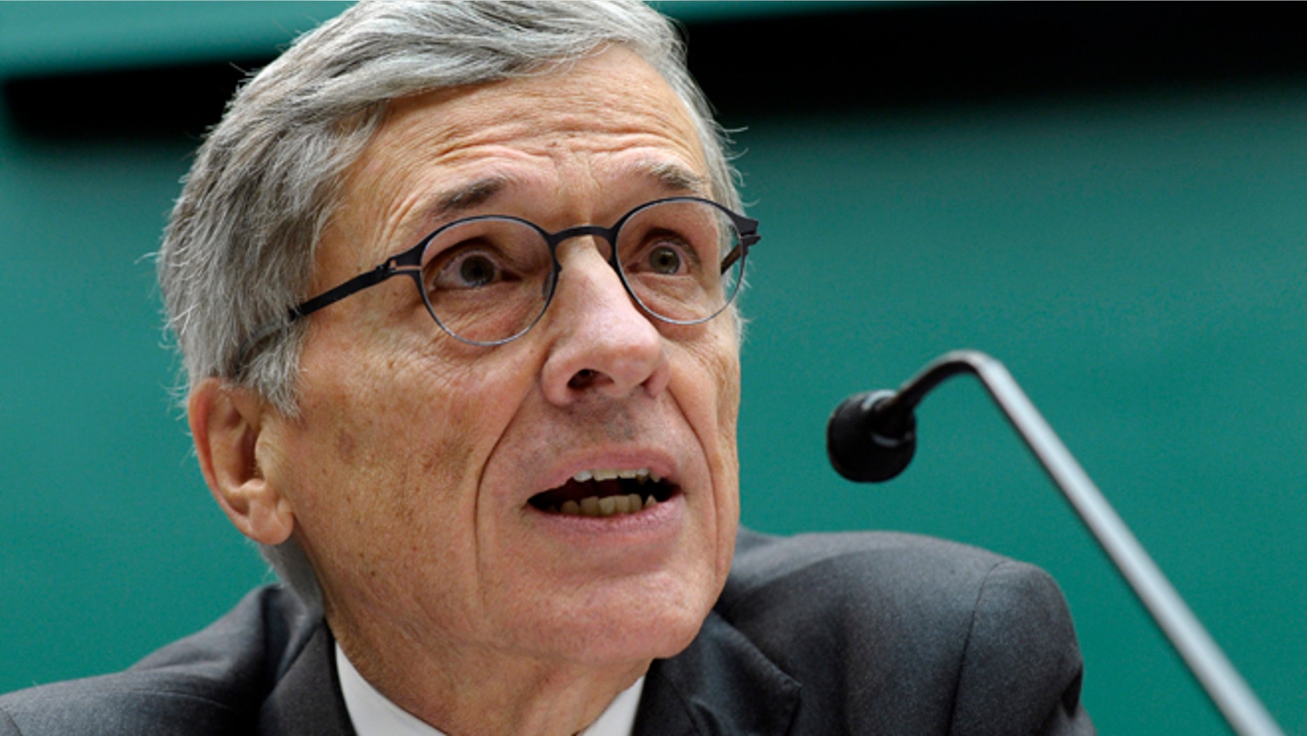 Dec.12, 2013: Federal Communications Commission (FCC) Chairman Tom Wheeler testifies on Capitol Hill in Washington.