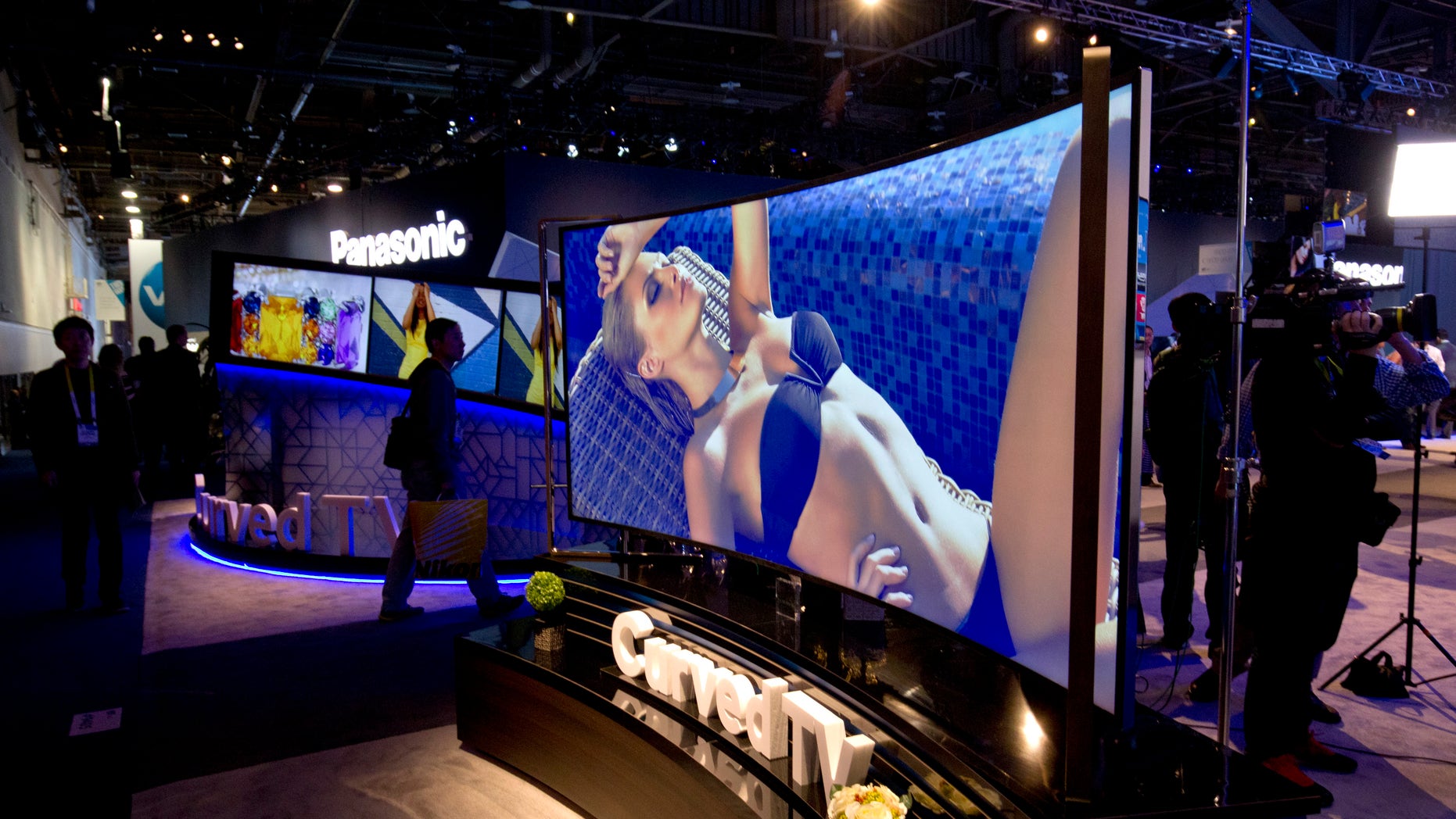 A 105-inch, curved 5K LED TV by Haier is displayed during the 2015 International Consumer Electronics Show (CES) in Las Vegas, Nevada January 6, 2015. REUTERS/Steve Marcus (UNITED STATES - Tags: SCIENCE TECHNOLOGY BUSINESS) - RTR4KANN