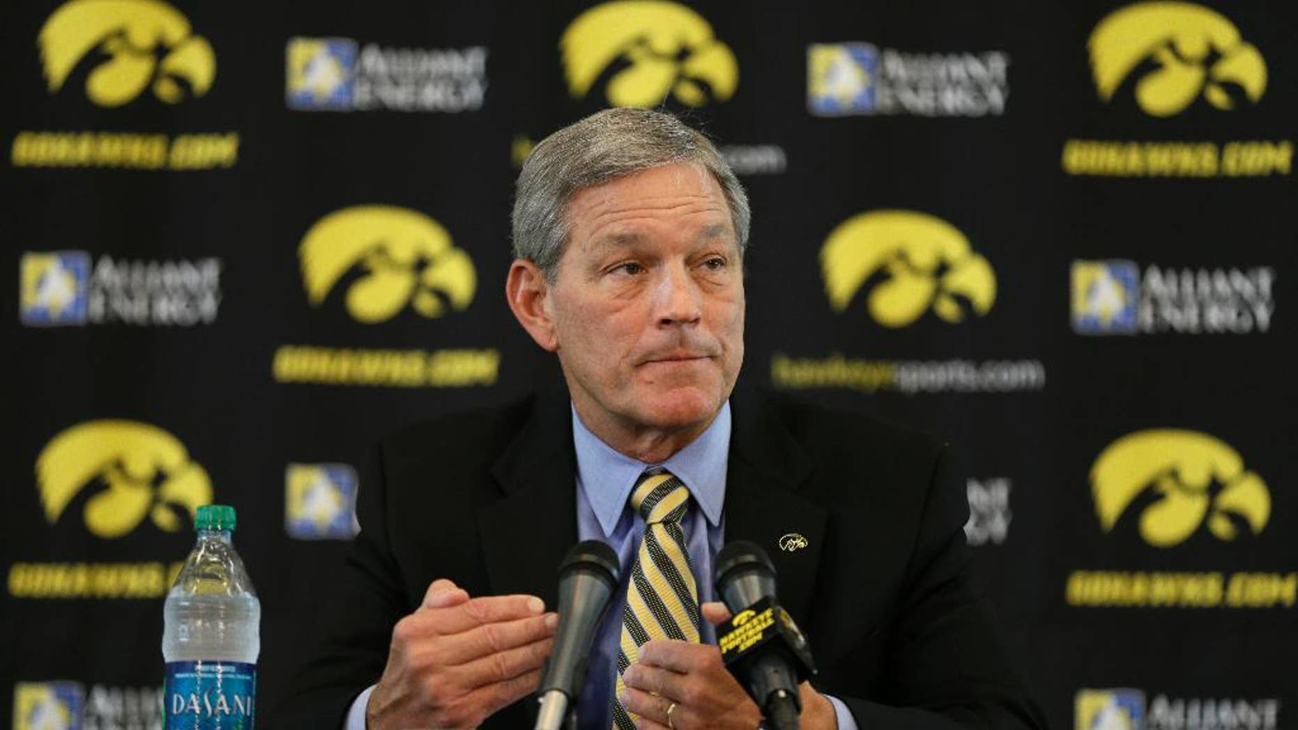 Iowa head coach Kirk Ferentz speaks to the media during Iowa's annual college football media day, Monday, Aug. 4, 2014, in Iowa City, Iowa. (AP Photo/Charlie Neibergall)
