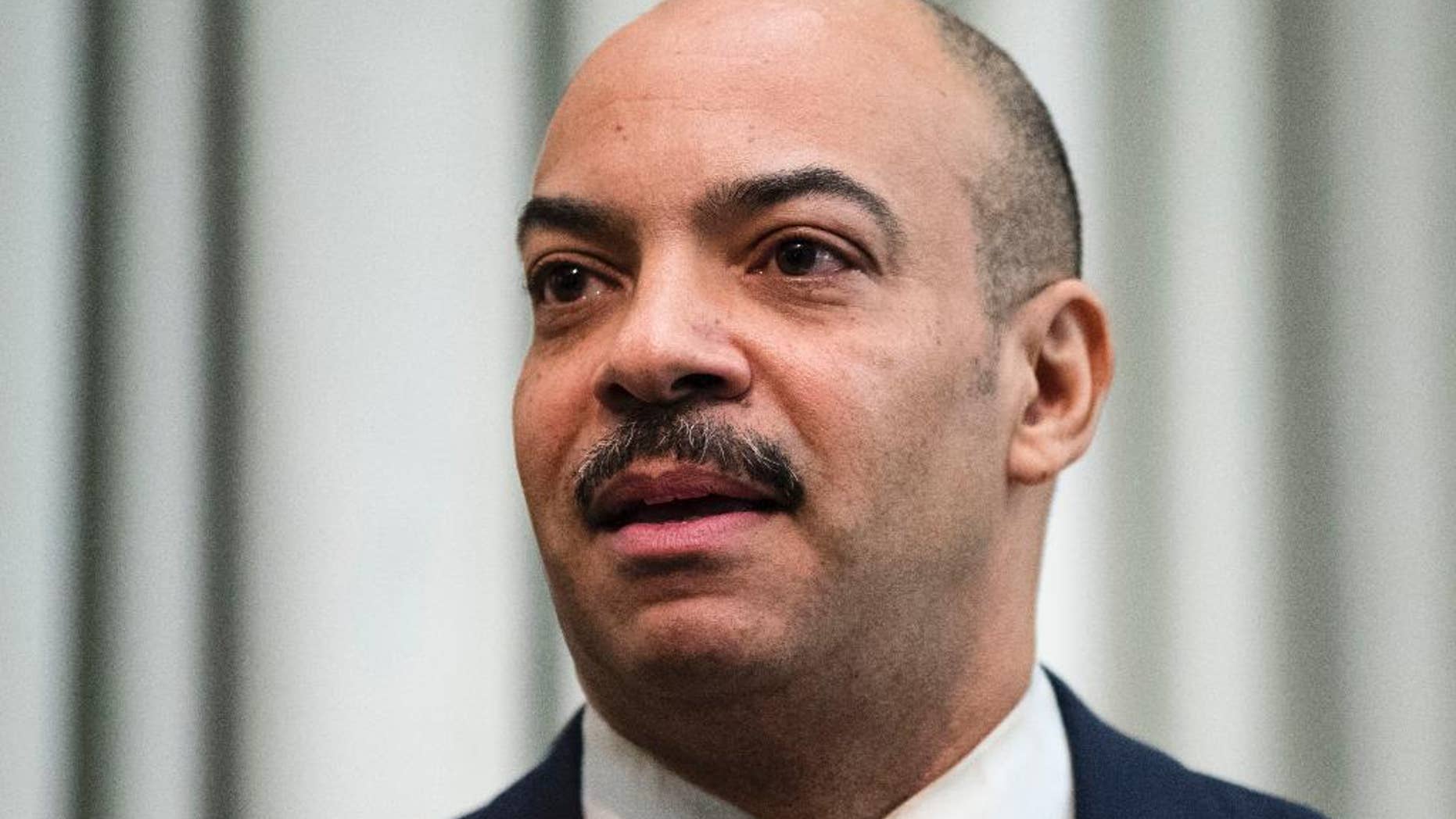FILE - In this Feb. 10, 2017 file photo, Philadelphia District Attorney Seth Williams speaks during a news conference in Philadelphia. Federal authorities have expanded a bribery case against Williams but say they don’t plan to delay the scheduled May 31 trial. Williams remains in the $175,000-a-year job but has a deputy oversee legal matters because his law license is suspended. (AP Photo/Matt Rourke)