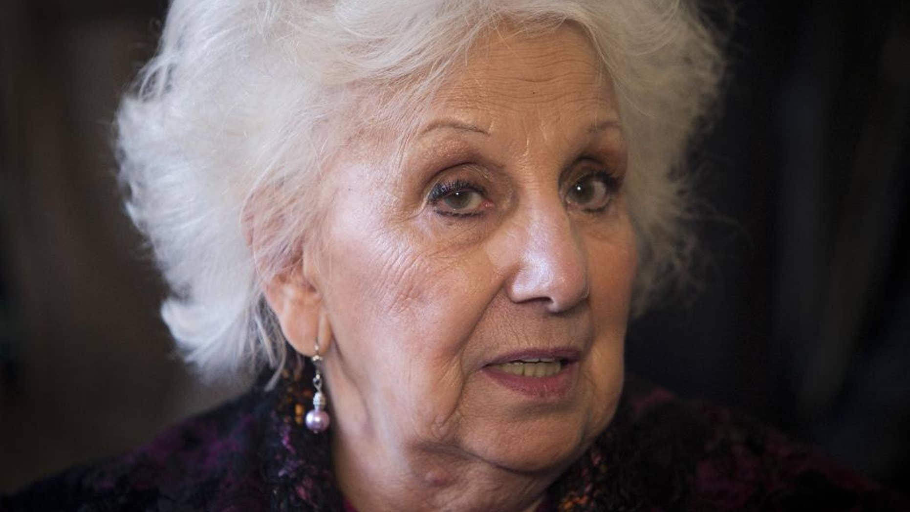 FILE - In this May 17, 2013 file photo, Estela de Carlotto, president of Grandmothers of Plaza de Mayo, speaks at a joint news conference, in Buenos Aires, Argentina. Carlotta, one of the most prominent human rights activists in Argentina has located the grandson born to her daughter in captivity during the so-called Dirty War. Estela’s son, Guido Carlotto, said Tuesday, Aug. 5, 2014, a DNA test has confirmed the identity of the grandson, now a 36-year-old musician. (AP Photo/Victor R. Caivano, File)