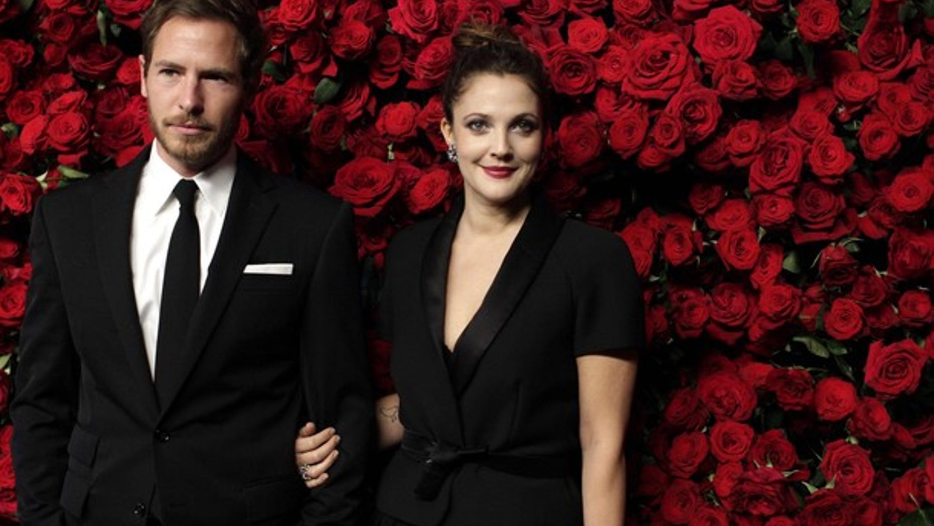 Nov. 15: Actress Drew Barrymore (R) and Will Kopelman (L) attend the Museum of Modern Art's fourth annual Film Benefit in New York. (REUTERS)