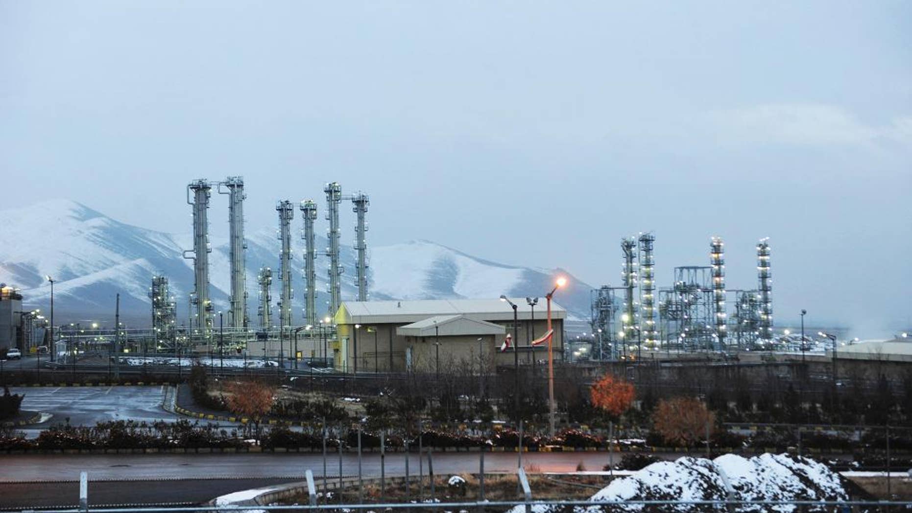 FILE - This Jan. 15, 2011 file photo shows Iran's heavy water nuclear facilities near the central city of Arak 150 miles (250 kilometers) southwest of Tehran. Two diplomats told The Associated Press on Monday, Nov. 21, 2016, that Iran has begun to export excess quantities of heavy water, which can be used in the process to make atomic arms, as Tehran moves to end a small but significant violation of a landmark nuclear deal. (Hamid Foroutan, ISNA, File via AP)