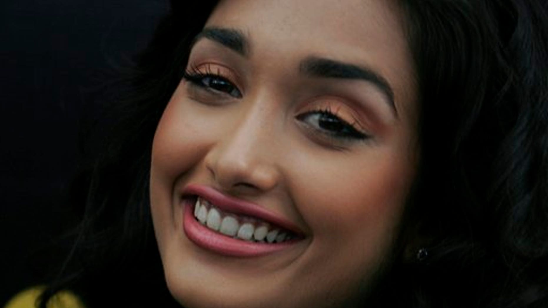 In this Dec. 19, 2008 file photo, Bollywood actress Jiah Khan smiles during a promotional event of her forthcoming Hindi movie "Ghajini" in Bangalore, India. Police said that Khan was found dead at her home in Mumbai late Monday, June 3, 2013.
