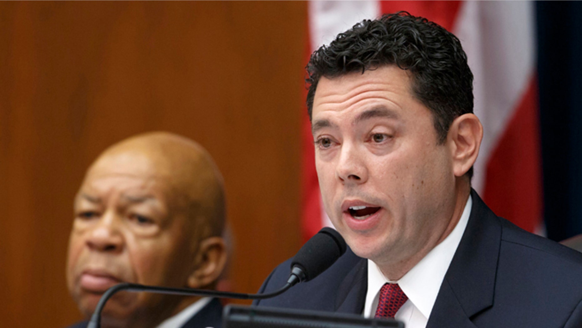 In this Sept. 30, 2014 file photo, Rep. Jason Chaffetz, R-Utah, accompanied by Rep. Elijah Cummings, D-Md., speaks on Capitol Hill in Washington.