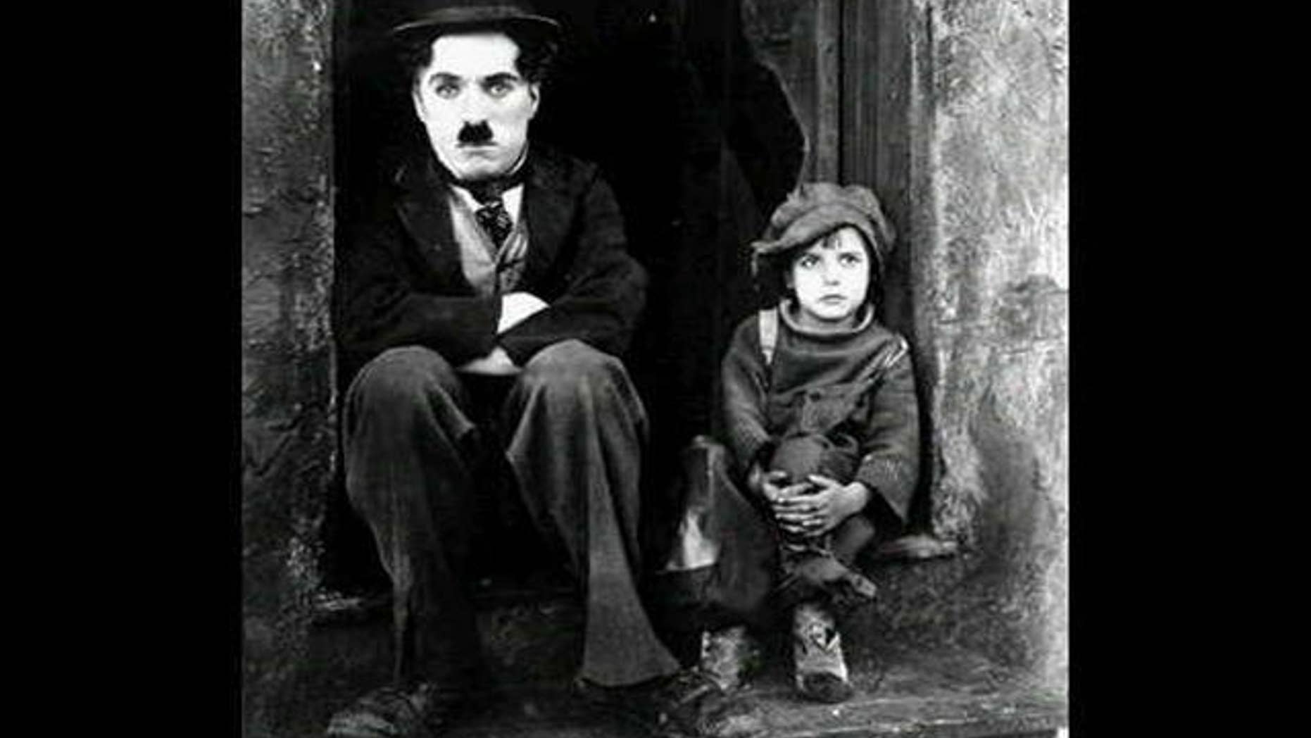 Charlie Chaplin and Jackie Coogan in "The Kid."