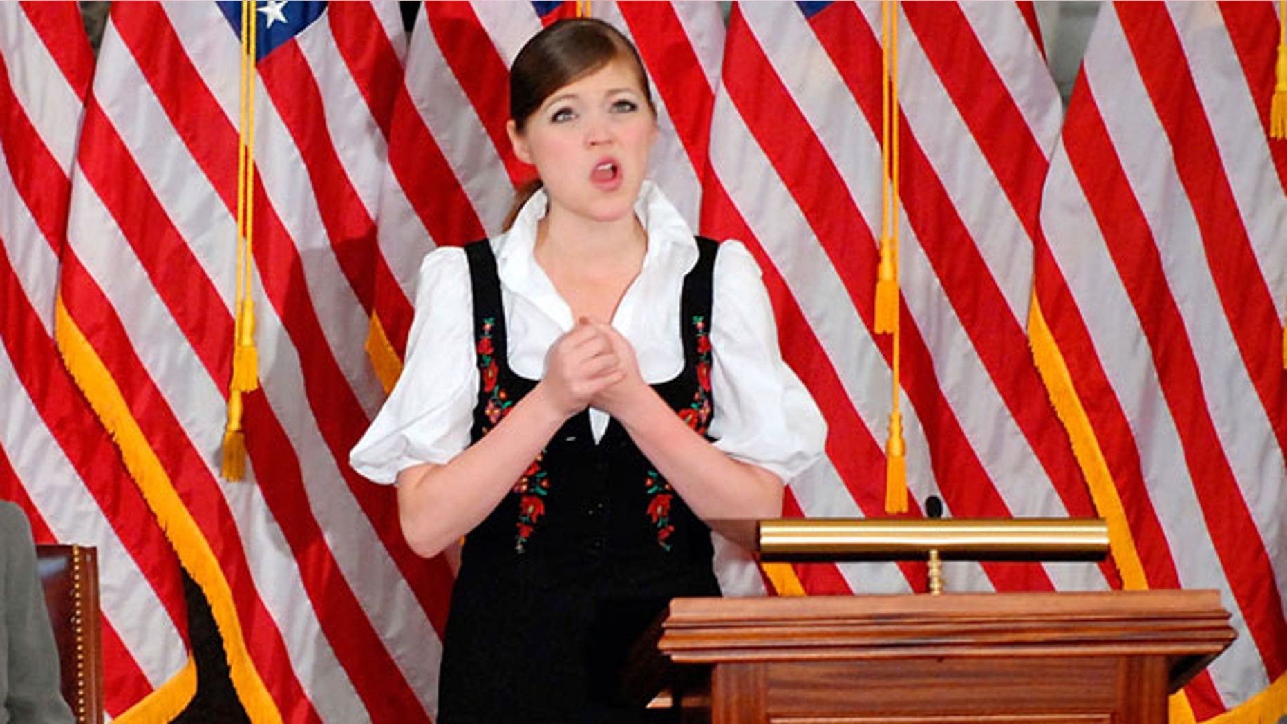 Charity Tillemann-Dick sings during a memorial service for her grandfather, late US Rep. Tom Lantos (D-CA), at the US Capitol in Washington, February 14, 2008.