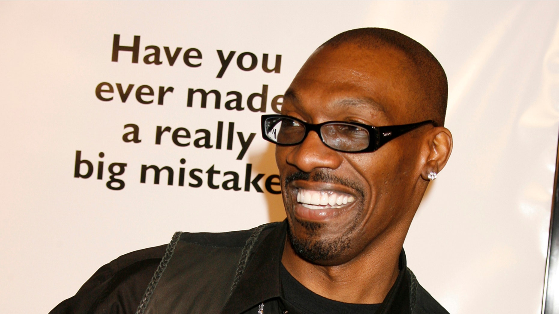 Charlie Murphy, brother of actor Eddie Murphy, poses at the premiere of the comedy "Norbit", starring Eddie Murphy, in Los Angeles February 8, 2007. REUTERS/Fred Prouser (UNITED STATES) - RTR1M5OZ