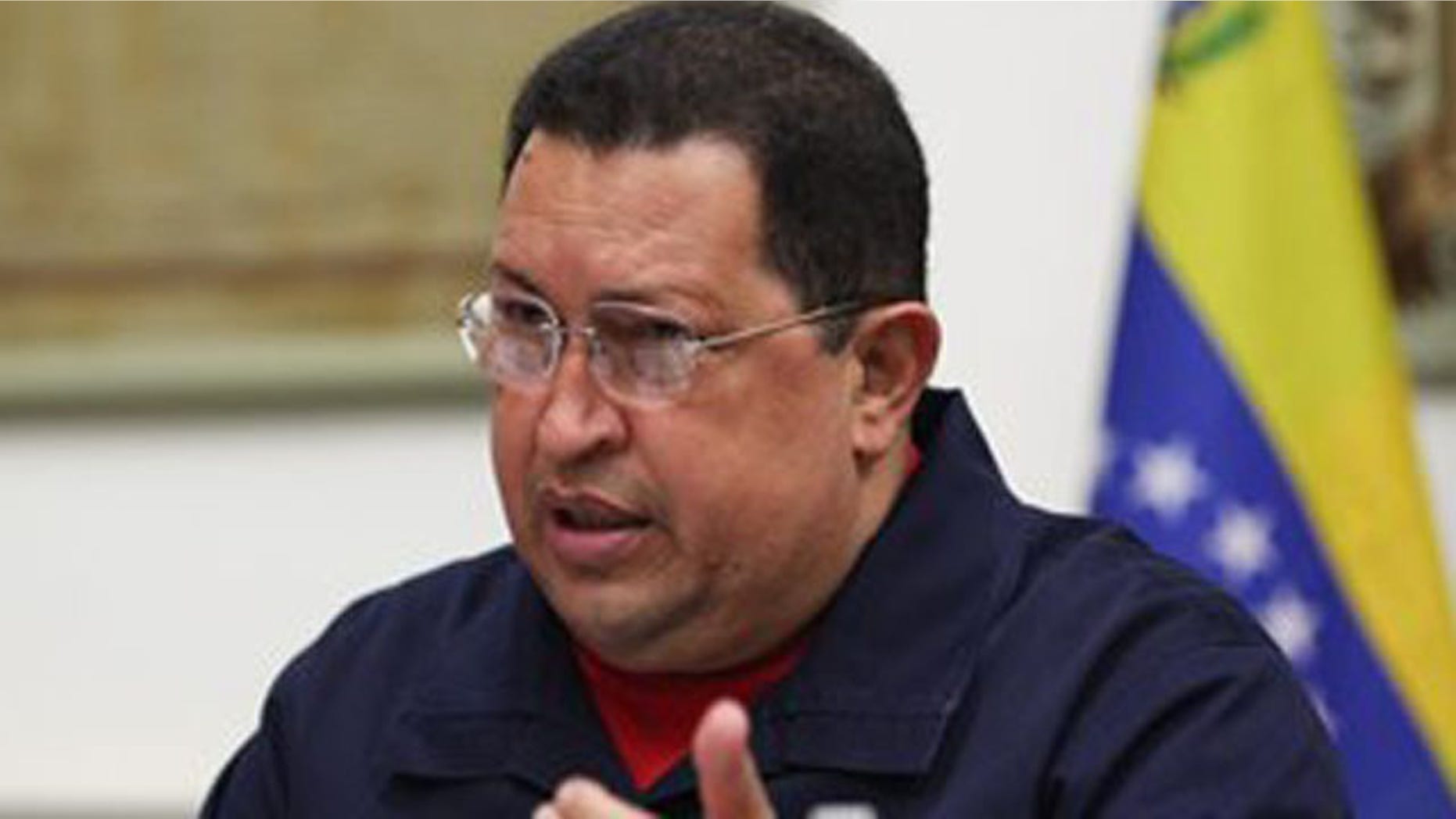 March 29, 2012: In this photo provided by the Miraflores Presidential Press Office, Venezuelan President Hugo Chavez, center, during a meeting with ministers.