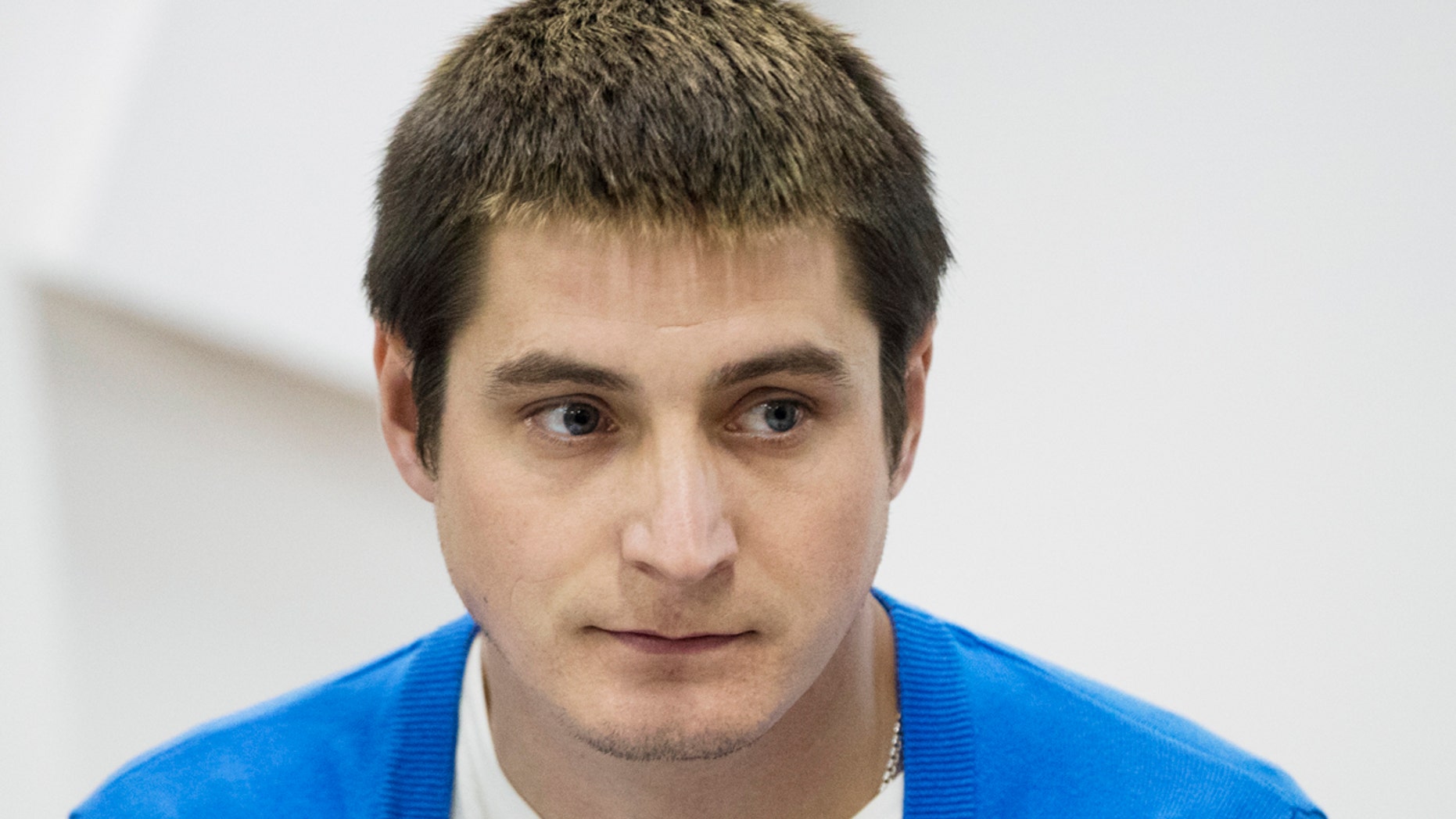 Maxim Lapunov, a Russian man who is accusing authorities in Chechnya of beating him as part of a crackdown on gay people in Russian region, speaks during a press conference in Moscow, Russia, Oct. 16, 2017.