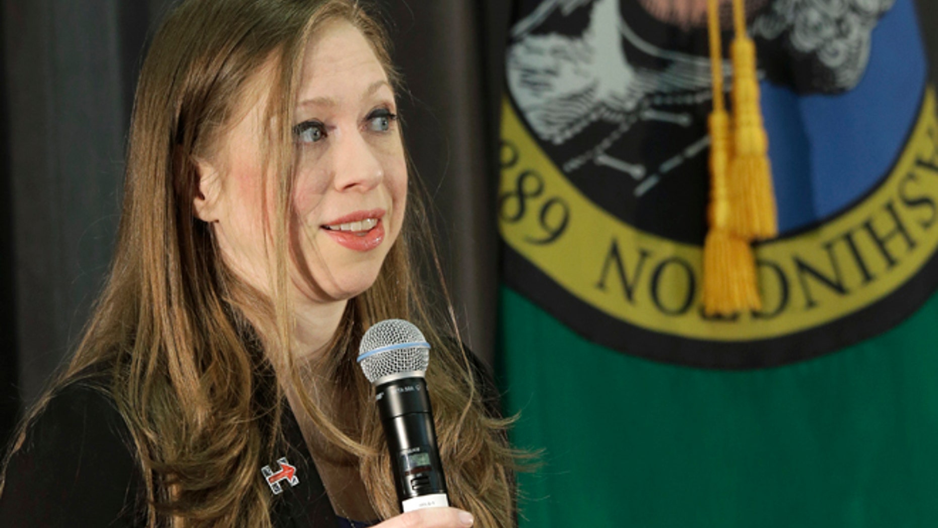 Mar. 22, 2016: Chelsea Clinton, daughter of Democratic presidential candidate Hillary Clinton, speaks next to the Washington state flag at Bates Technical College in Tacoma, Wash.