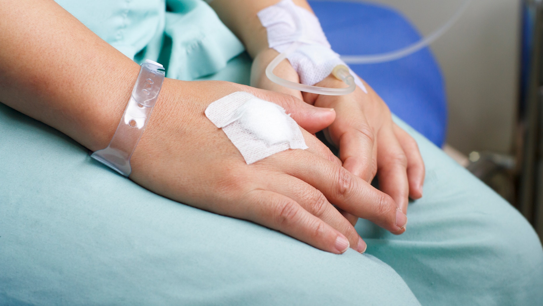 woman patient in hospital with saline intravenous (iv)