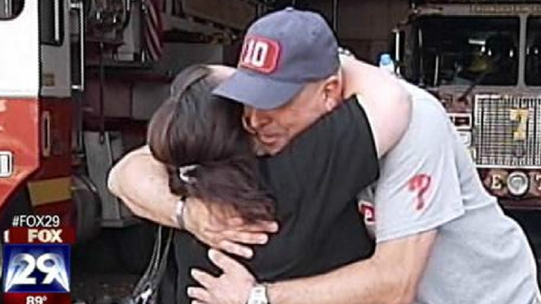 This photo shows Philadelphia fireman Fran Cheney and Mary Jackson, the woman he rescued from a warehouse fire.