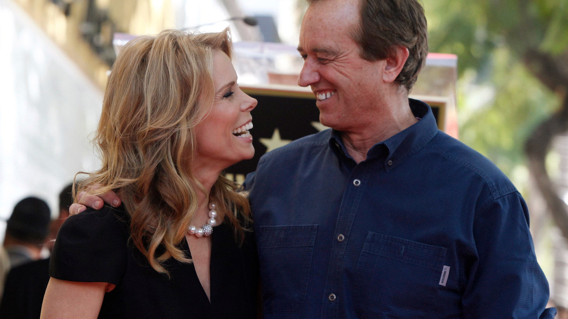 January 29, 2014. Actress Cheryl Hines (L) smiles at her boyfriend Robert F. Kennedy Jr. during ceremonies honoring Hines with a star on the Hollywood Walk of Fame in Hollywood, California.