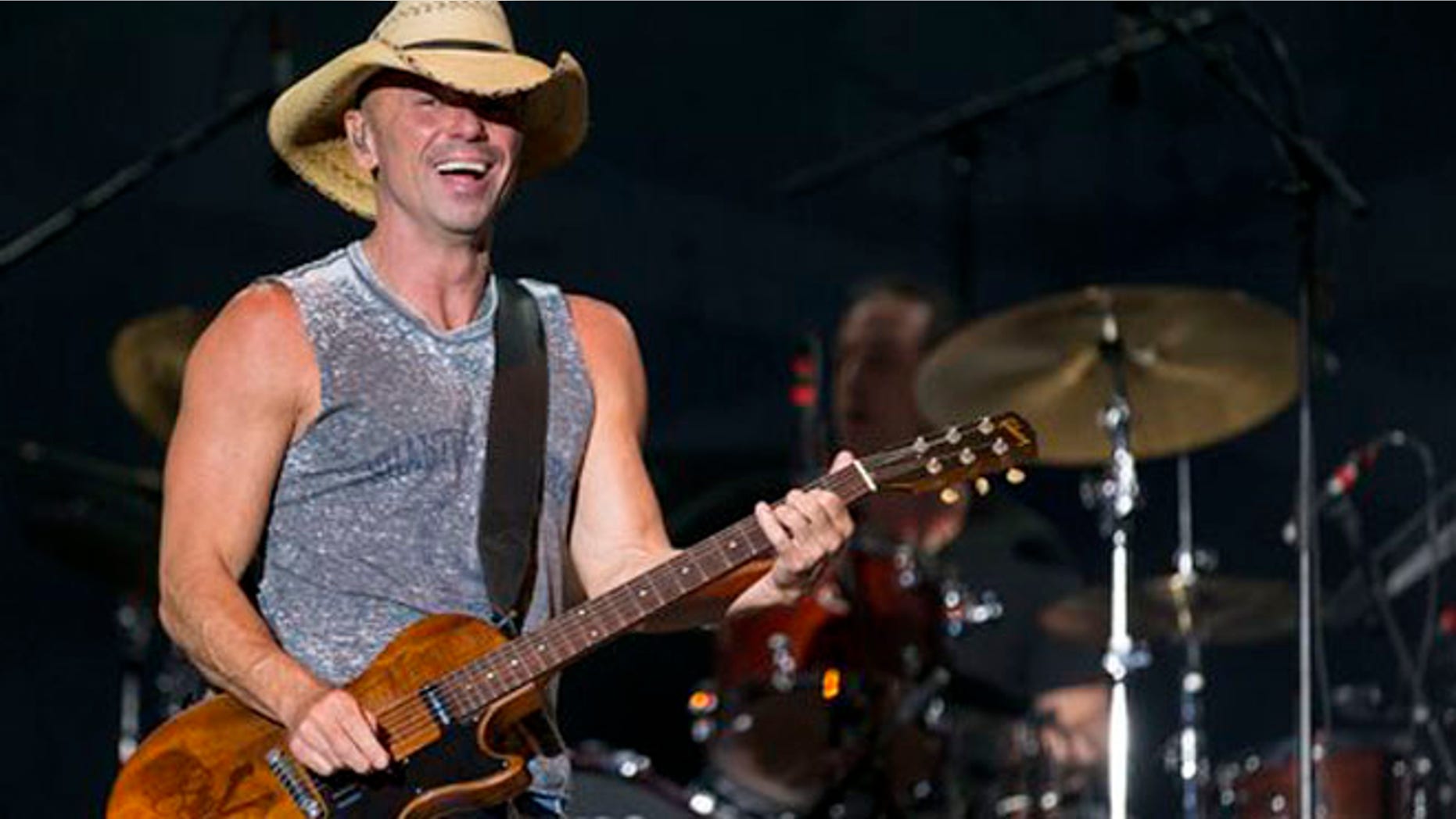 In this April 3, 2016, photo, Kenny Chesney performs at the 4th Annual ACM Party for a Cause Festival in Las Vegas. (Photo by Eric Jamison/Invision/AP)