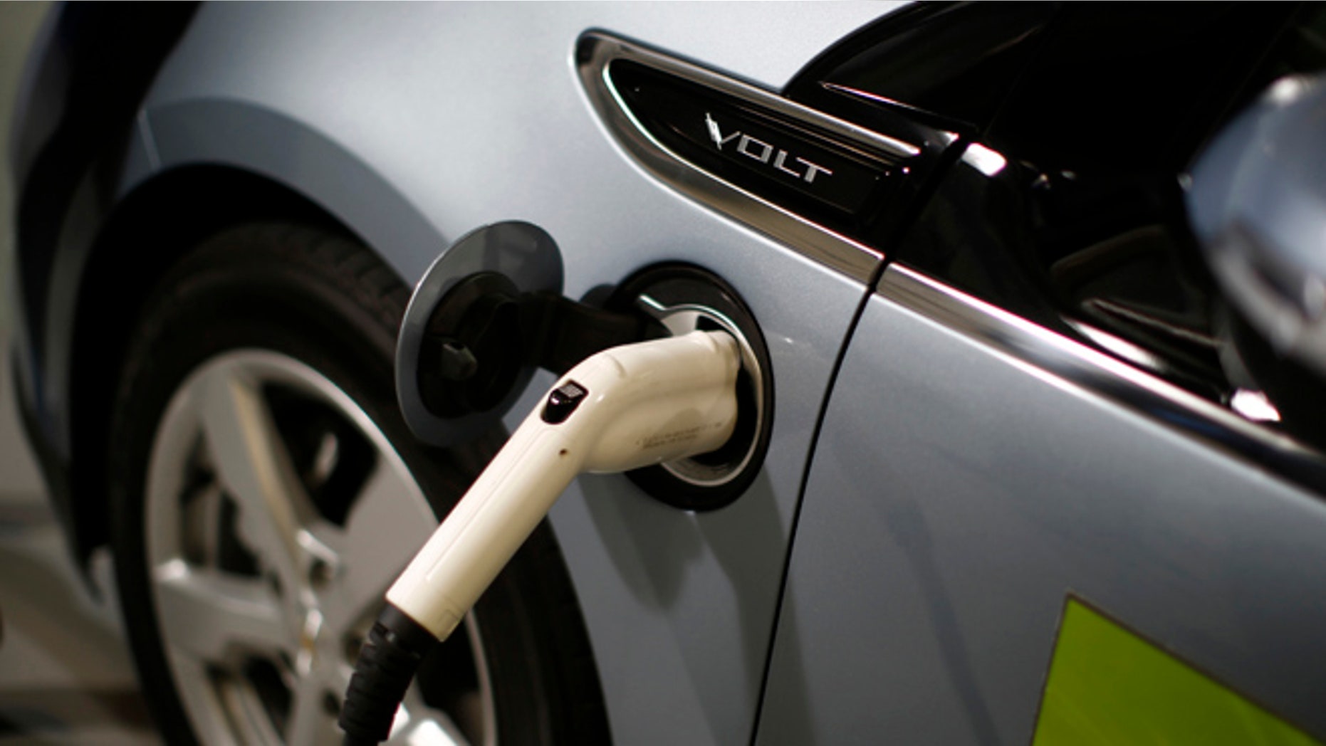 March 15, 2013: A Chevy Volt electric car is shown being charged during a tour of the Argonne National Lab near Chicago by U.S. President Barack Obama.
