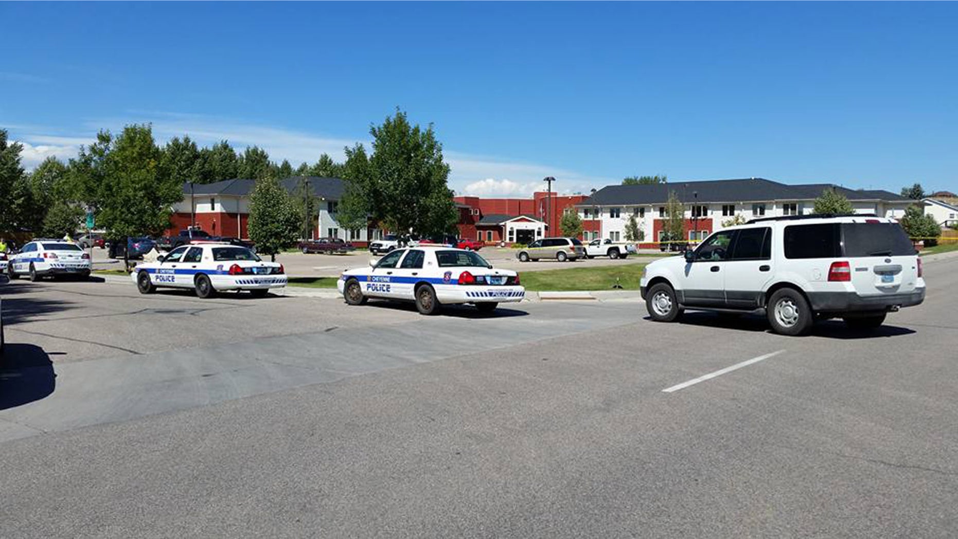 Sept. 14, 2016: Police surround the Heritage Court senior living apartment complex in Cheyenne, Wyo. after a shooting